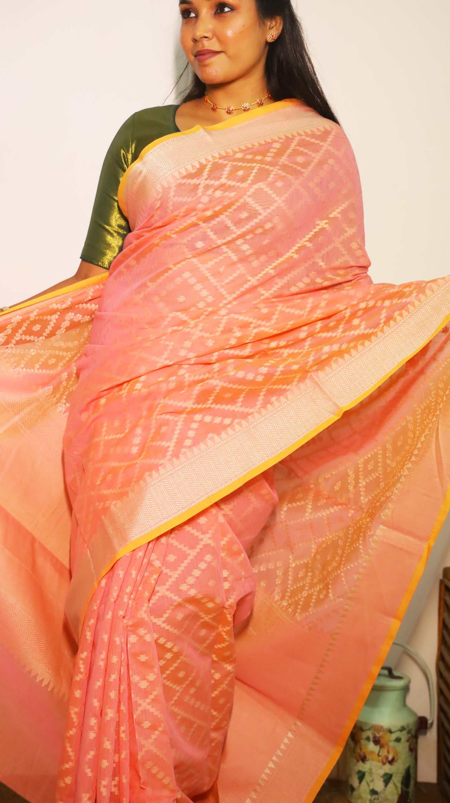 Finest pastel pink Chanderi Silk Cotton saree featuring subtle geometric woven patterns all over with golden border - VEDHIKA