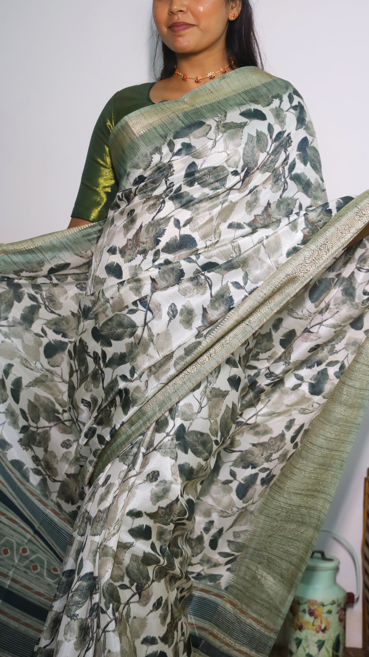 Artisanal monochrome soft cotton silk saree with leaf patterns and green border - AVANTHIKA