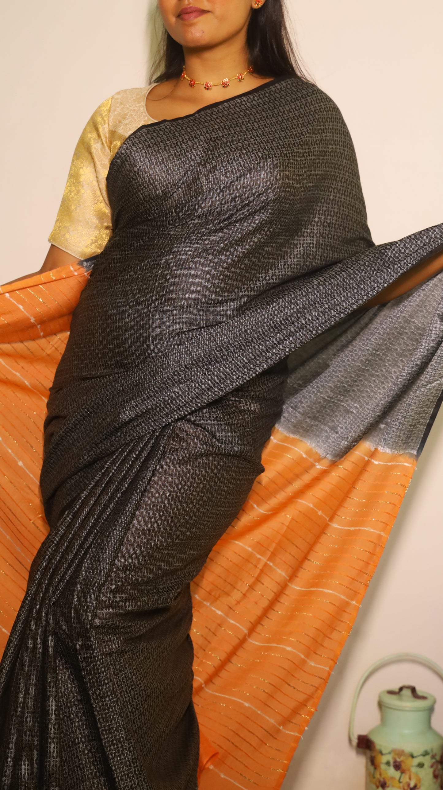 Elegant Black Semi Tussar Silk Saree with silver stripes and orange pallu - PREETHIKA