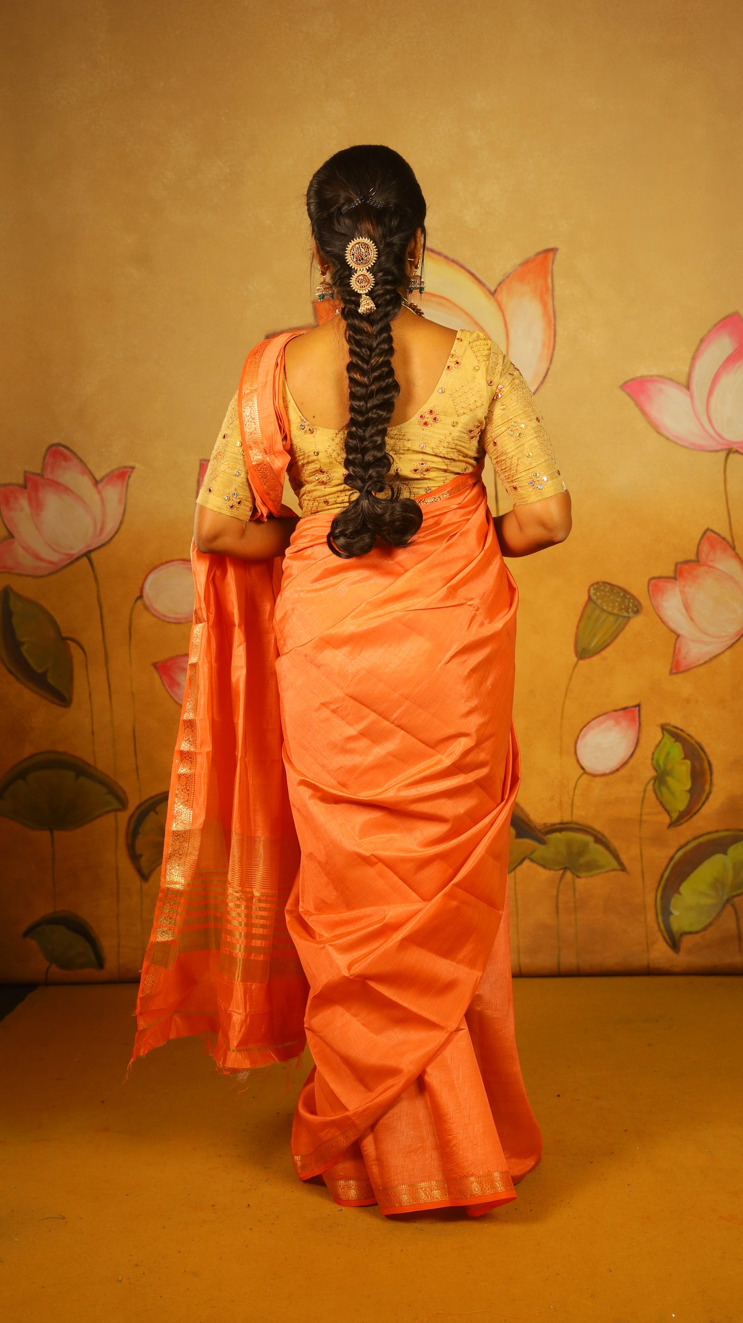 Luxury pale orange Semi Soft Silk Saree with rich gold zari woven border - AVANTHIKA