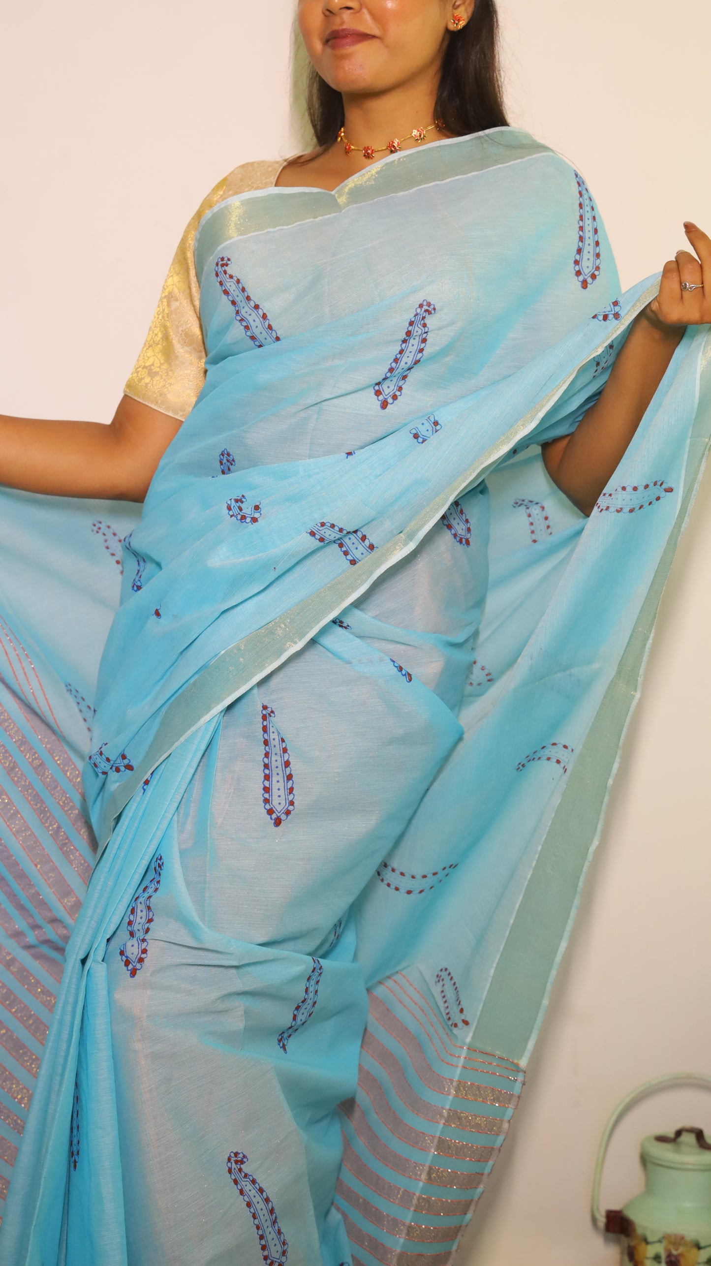 Breathable light blue cotton saree with block prints and gold zari border - BOOMIKA