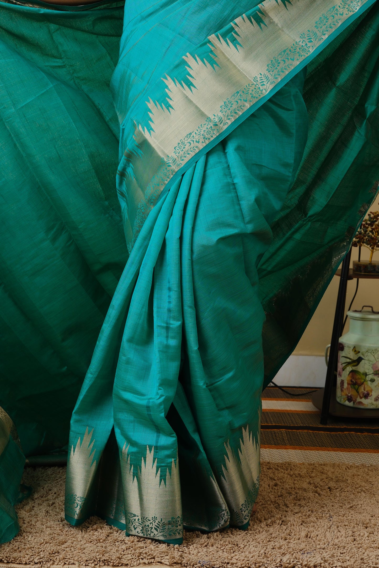 Soft silk in emerald green with tanjore zari porder and striped pallu - AVANTHIKA