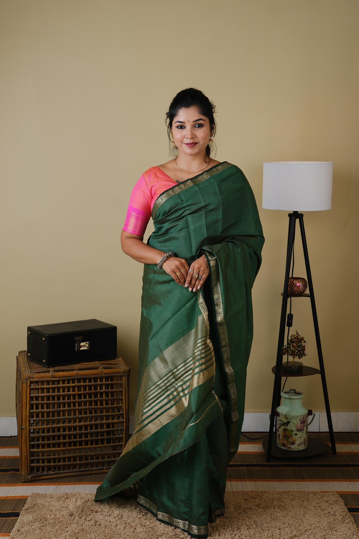 Exquisite soft silk olive green saree with zari border - AVANTHIKA