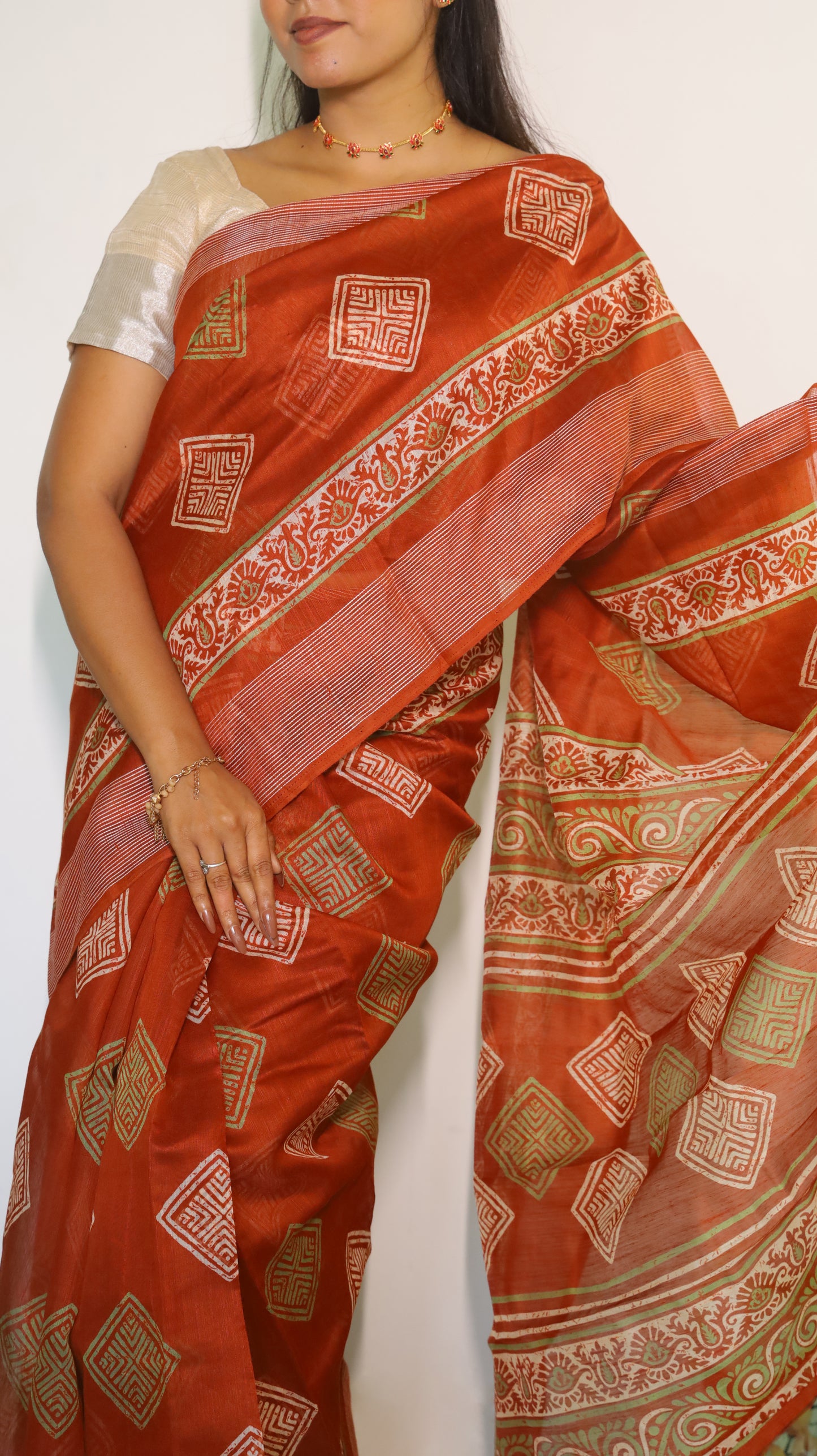 Elegant brick red silk cotton saree with traditional motifs- VEDHIKA