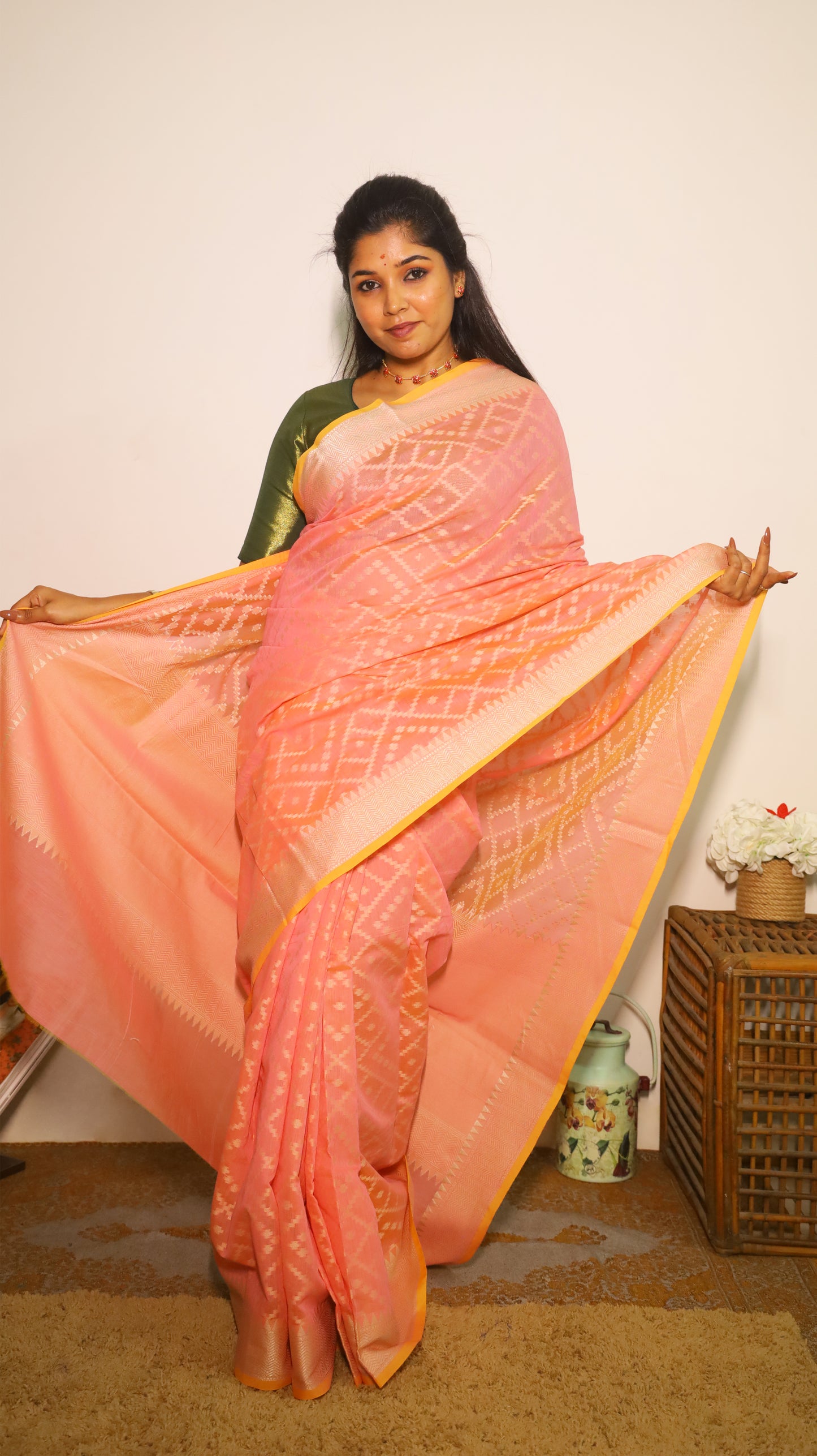 Finest pastel pink Chanderi Silk Cotton saree featuring subtle geometric woven patterns all over with golden border - VEDHIKA