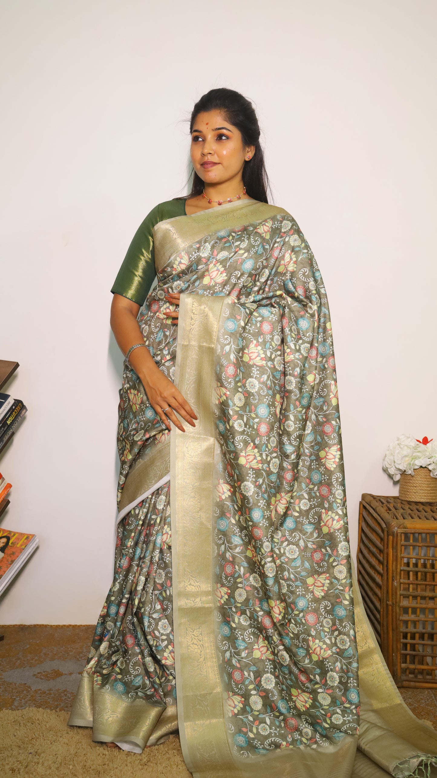 Elegant Kalamkari Design Semi Silk Cotton Saree with a light green floral body with gold zari border - VEDHIKA
