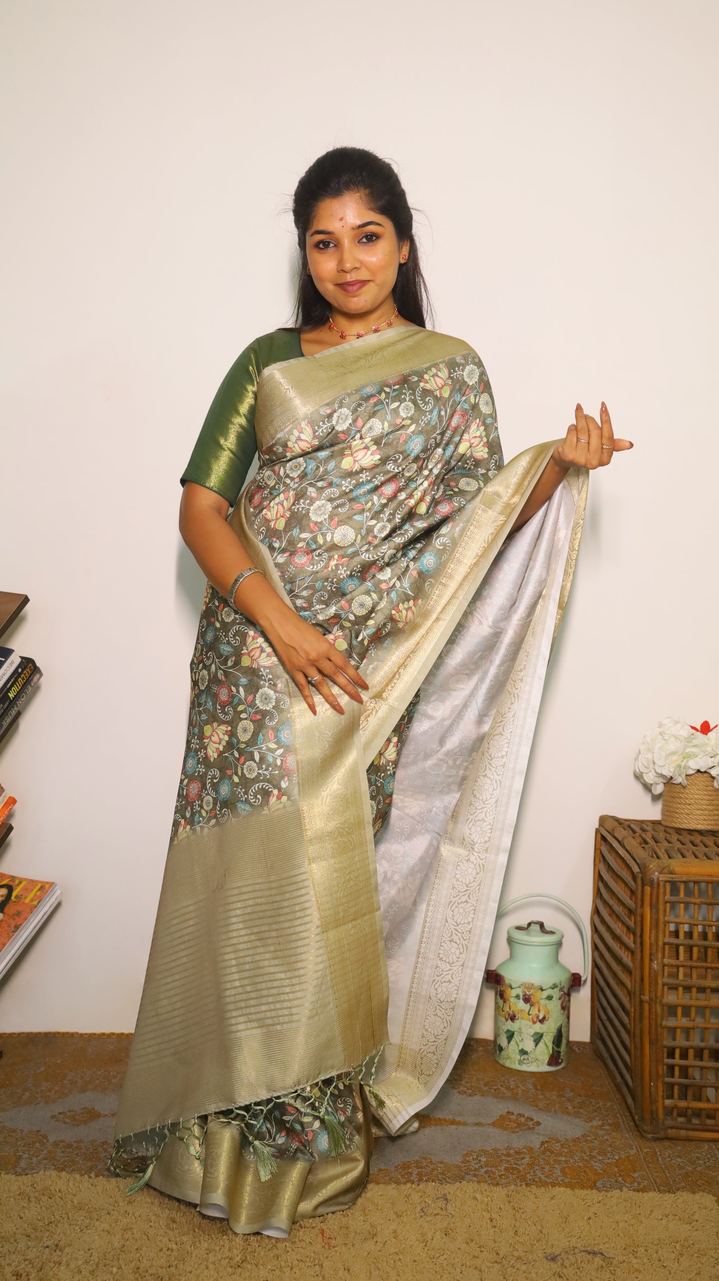 Elegant Kalamkari Design Semi Silk Cotton Saree with a light green floral body with gold zari border - VEDHIKA