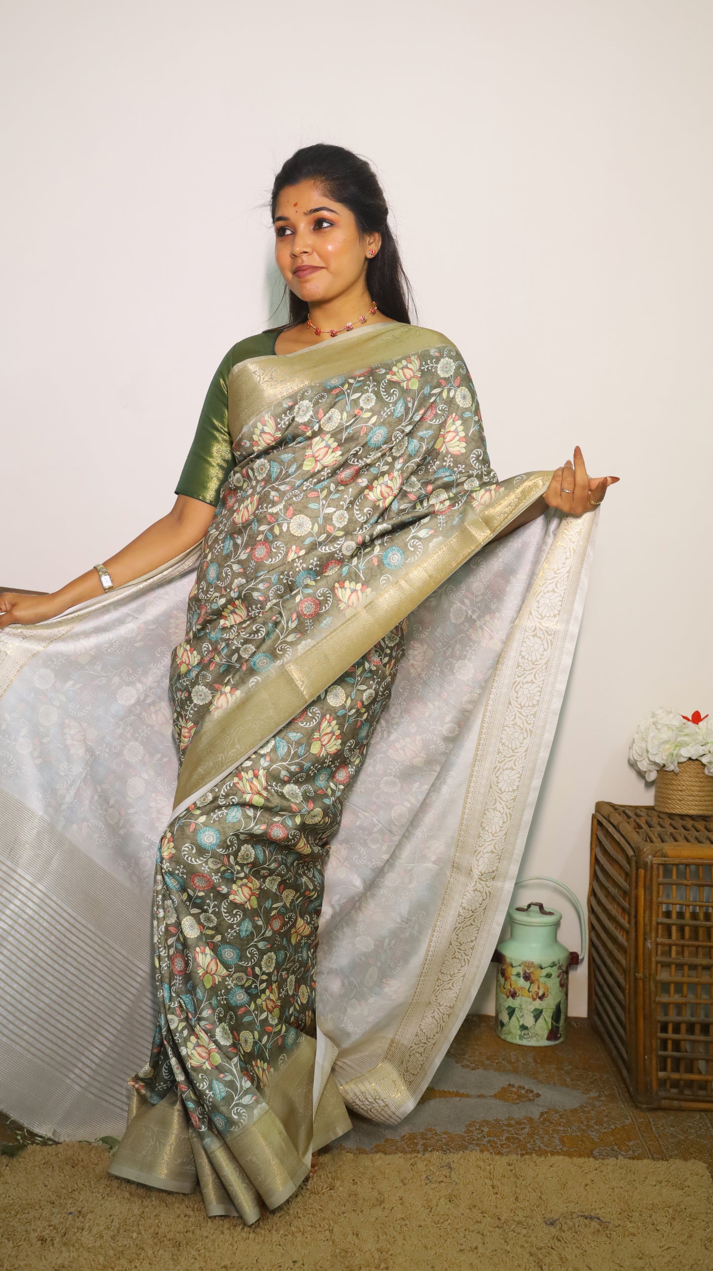 Elegant Kalamkari Design Semi Silk Cotton Saree with a light green floral body with gold zari border - VEDHIKA