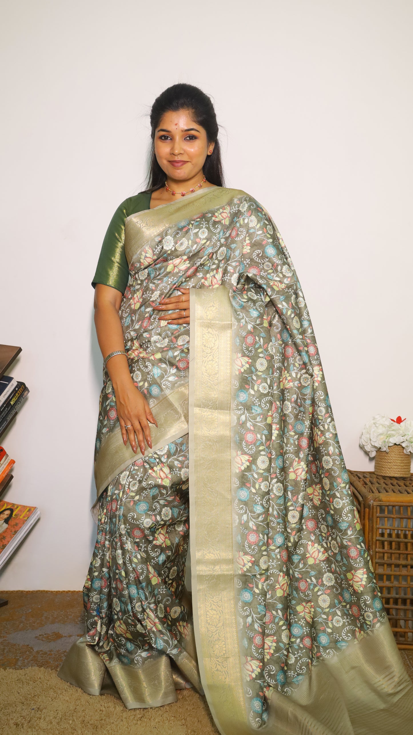 Elegant Kalamkari Design Semi Silk Cotton Saree with a light green floral body with gold zari border - VEDHIKA