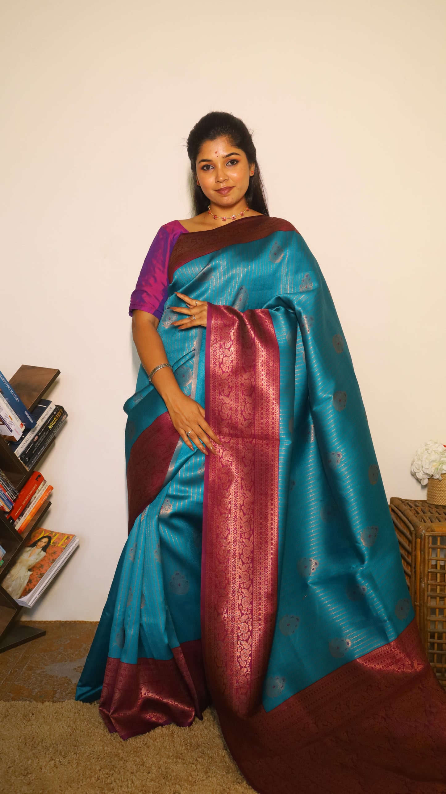 Luxurious semi soft silk saree in peacock green and purple border with gold zari - AVANTHIKA