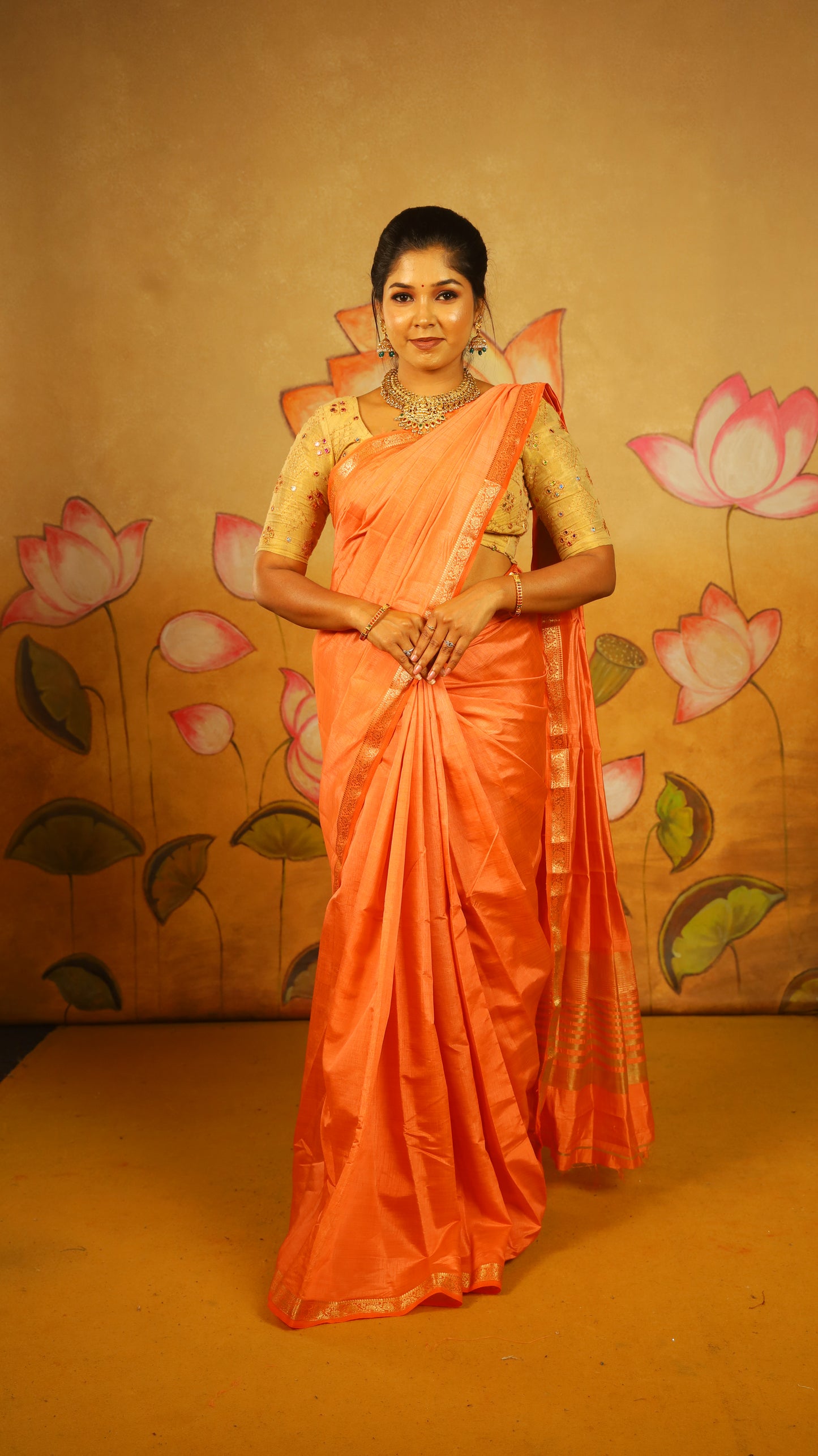 Luxury pale orange Semi Soft Silk Saree with rich gold zari woven border - AVANTHIKA