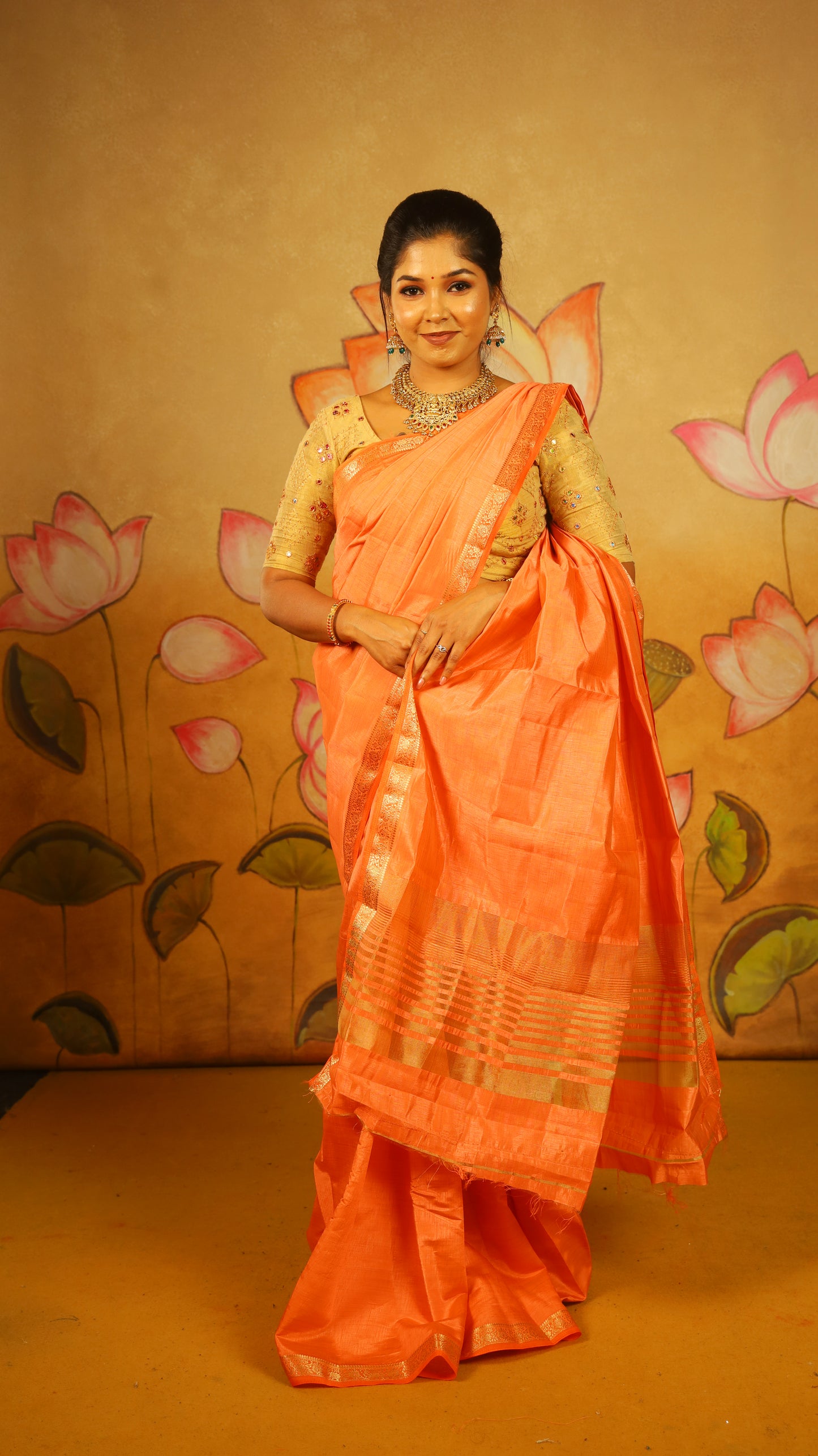 Luxury pale orange Semi Soft Silk Saree with rich gold zari woven border - AVANTHIKA