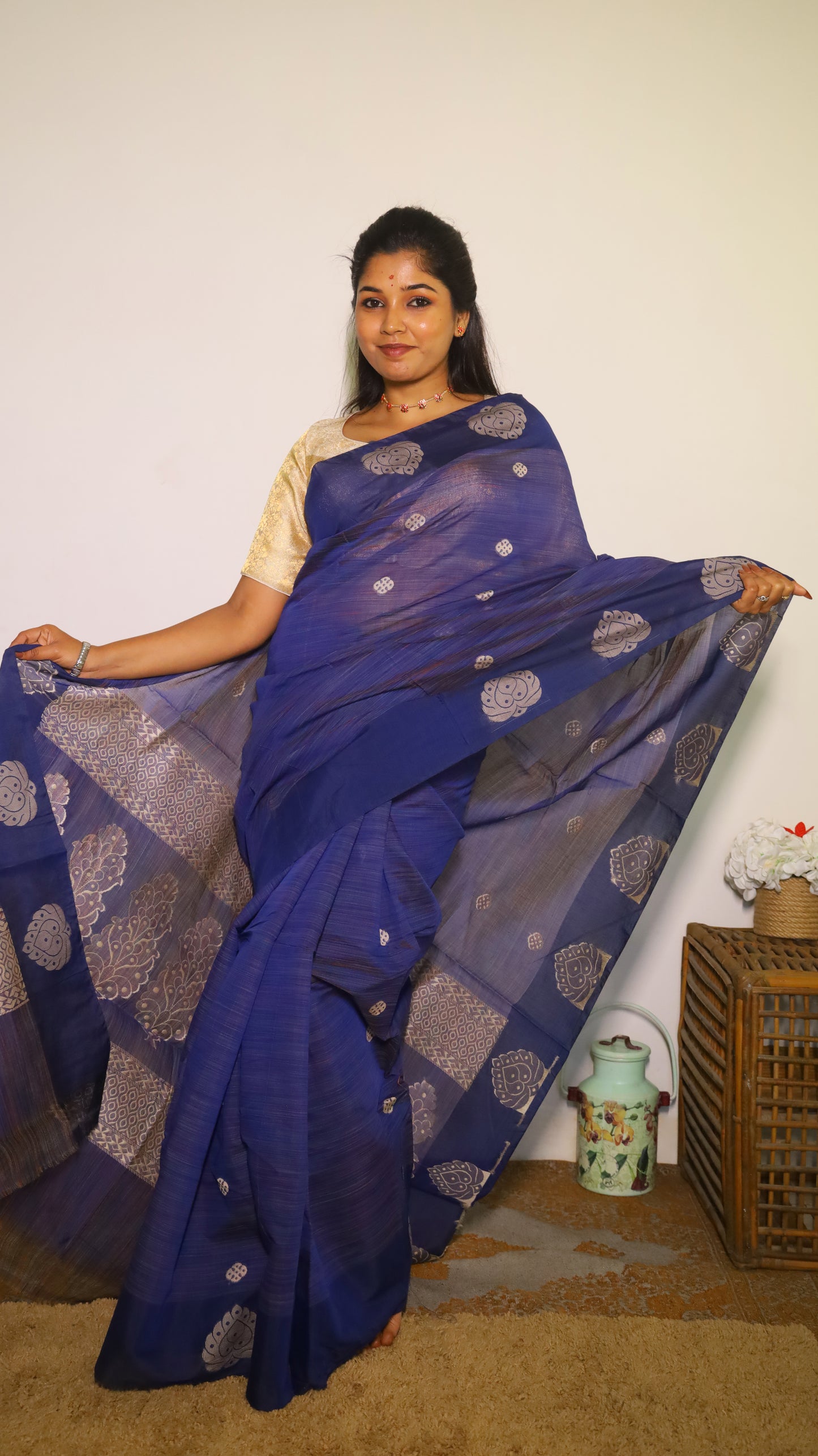 Timeless rich navy blue saree adorned with bold silver floral motifs - BOOMIKA