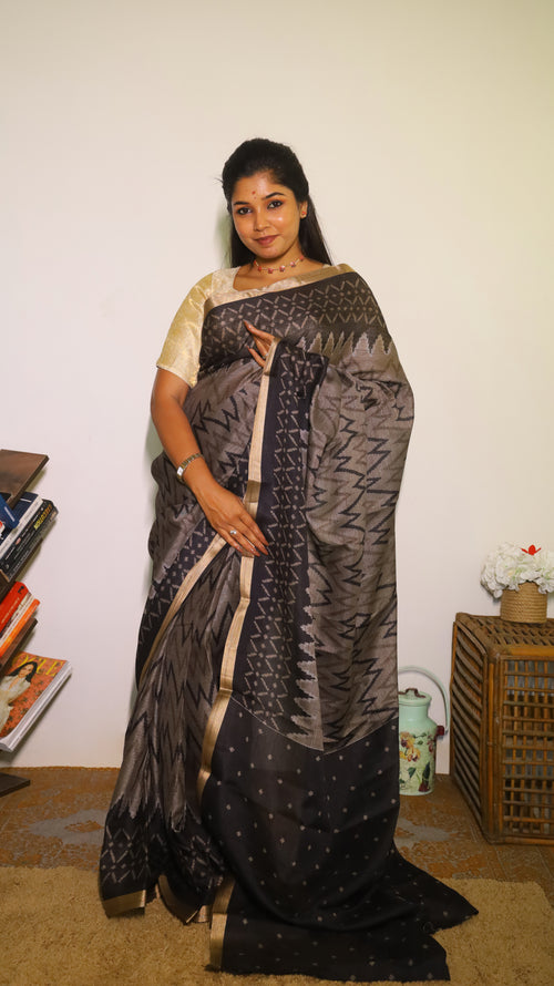 Elegant semi silk cotton saree in striking black with ikkat design - VEDHIKA