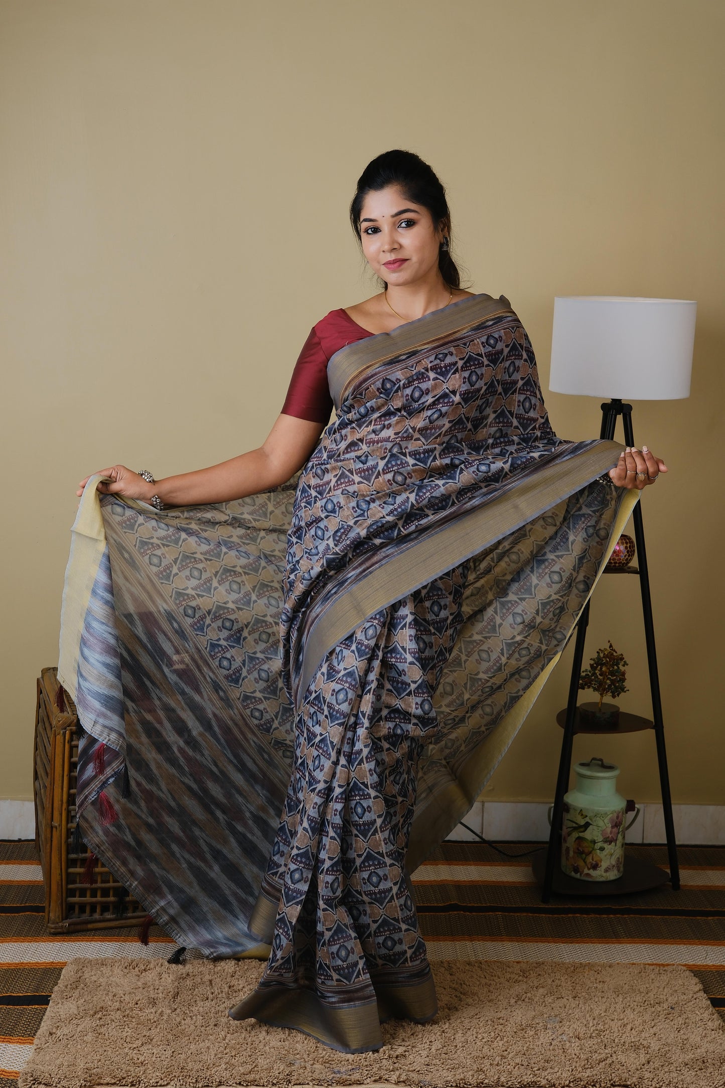 Soft cotton in light grey with all over tribal print and self zari border - BOOMIKA