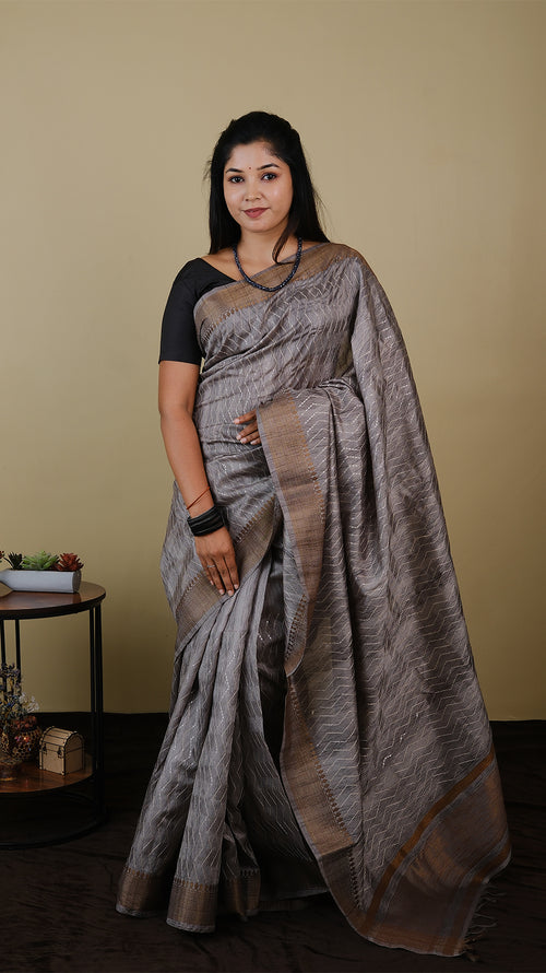 Semi silk grey saree with all over thread and chumki work and anti gold woven zari border - KRITHIKA (40009022)