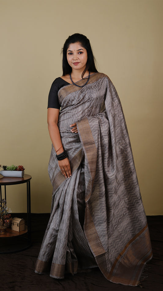 Semi silk grey saree with all over thread and chumki work and anti gold woven zari border - KRITHIKA (40009022)