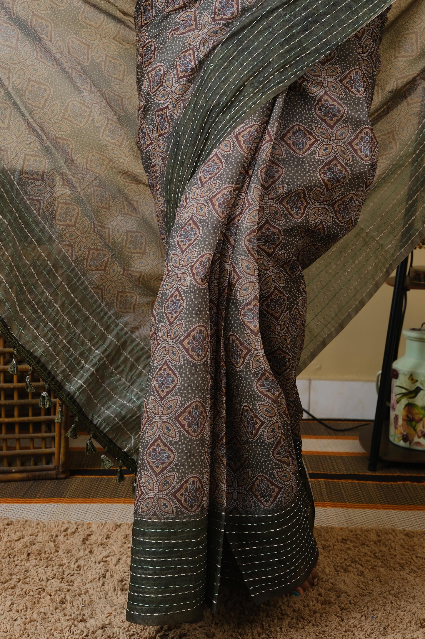 Soft cotton in olive green with mughal print and olive green embroided border - BOOMIKA