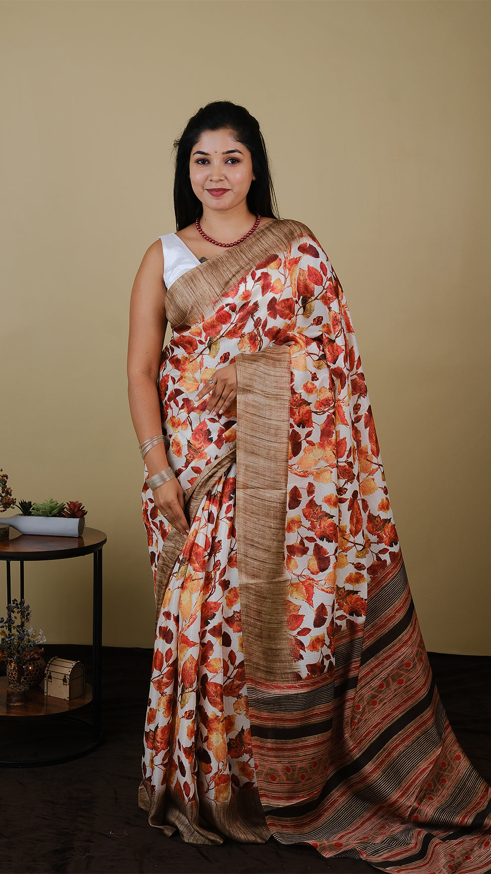 Digital saree in autumn brown with red leaf motif and satin border - AVANTHIKA (20003007)