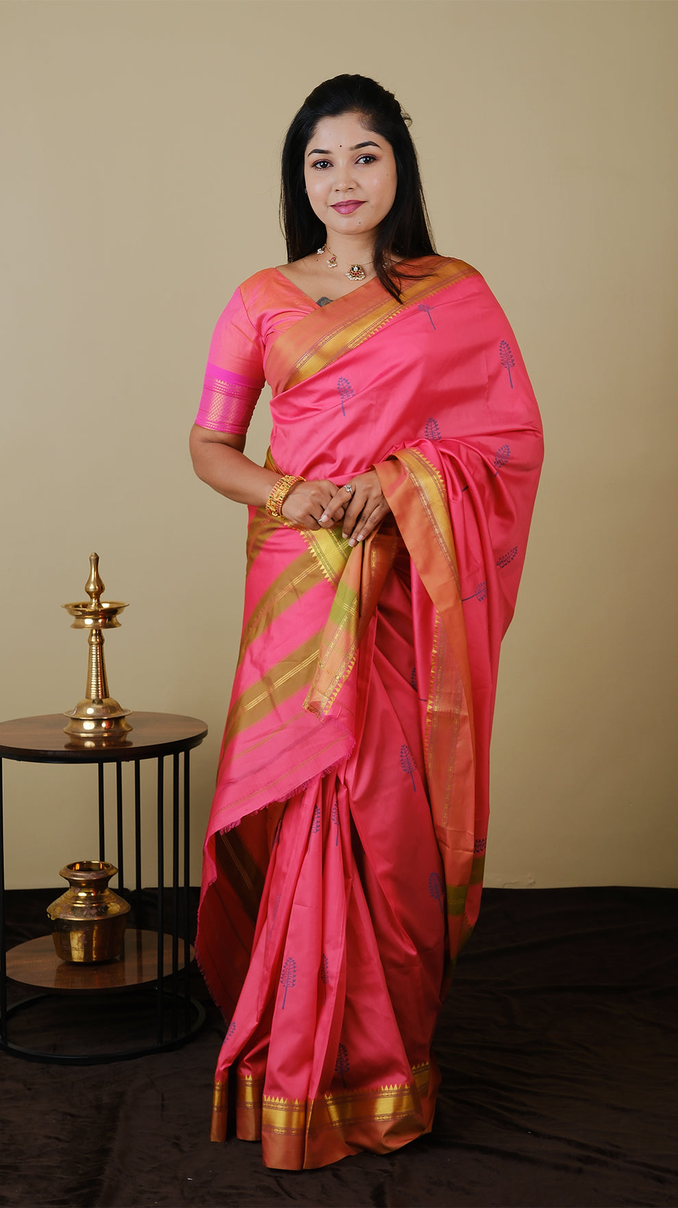 Elegant peach pink with olive combination silk saree adorned with blue woven motifs and contrasting gold zari border - AVANTHIKA (20003006)