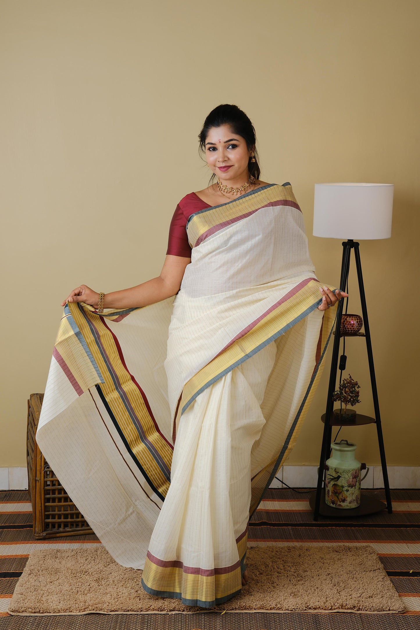 Pure kasavu cotton with striped zari body and double coloured border and pallu in traditional green and maroon - AVANTHIKA