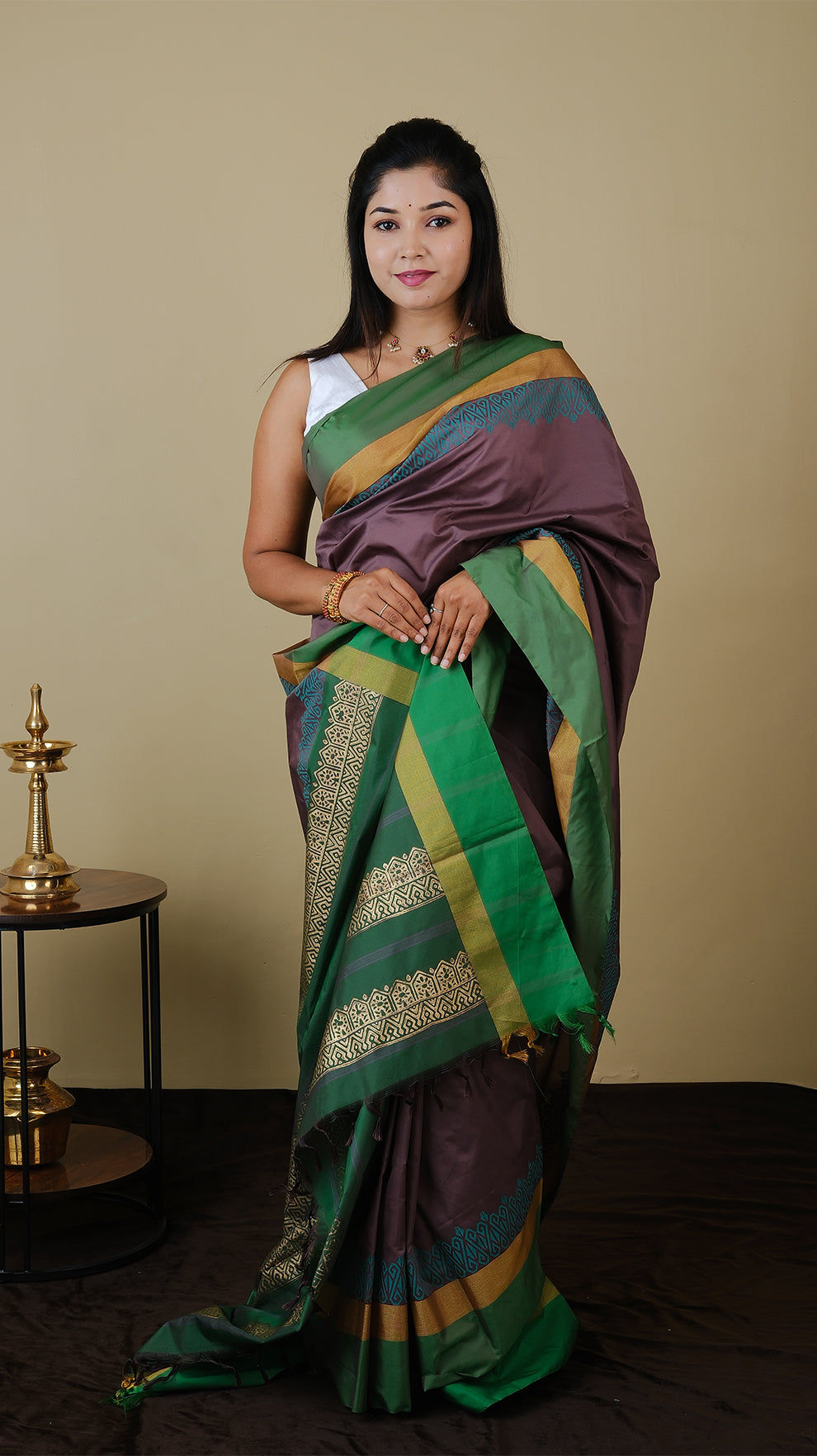 Soft silk saree in purplish brown and sea green block print with simple border in gold zari and parrot green - AVANTHIKA (20014003)