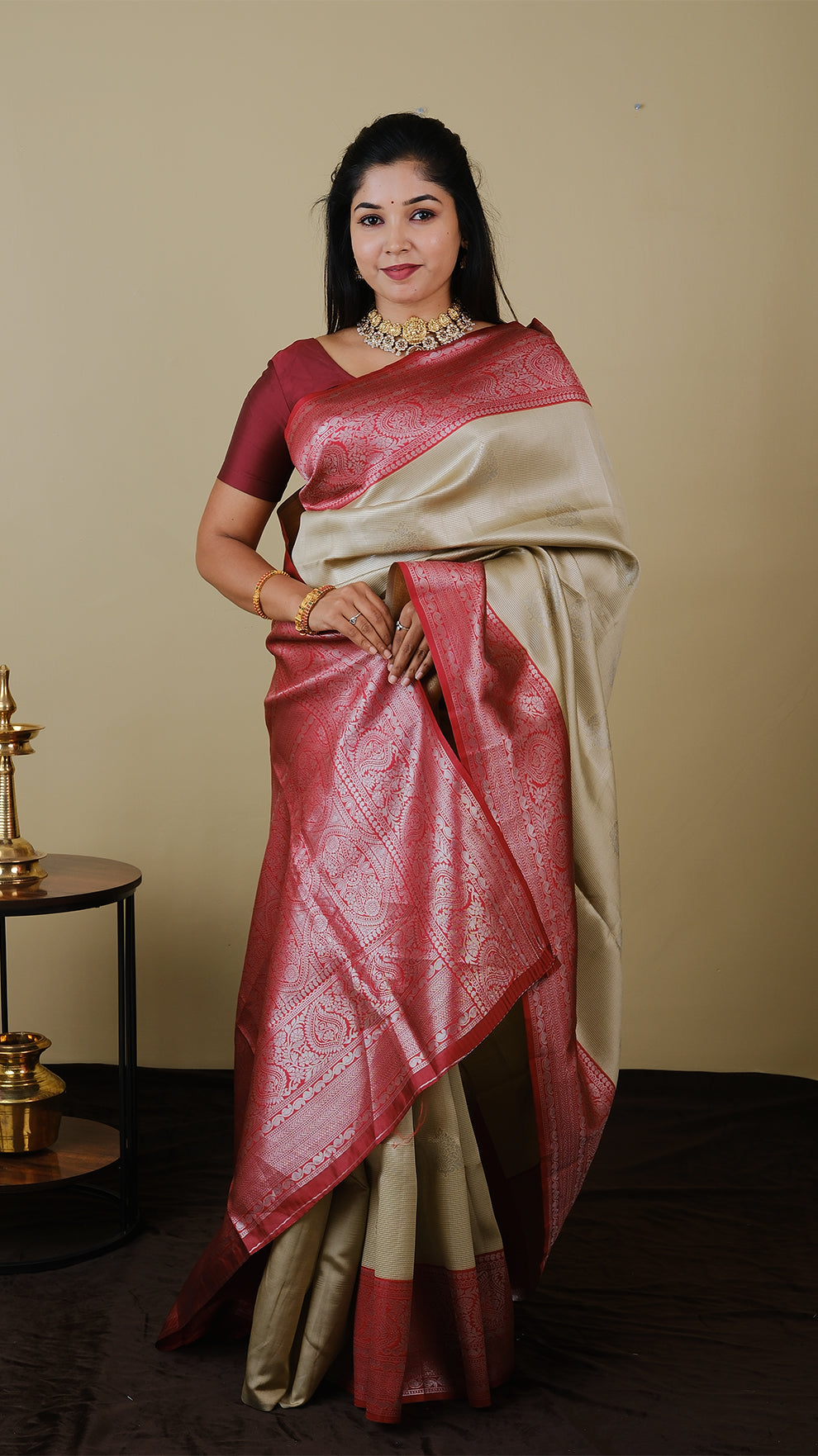 Mango silk brocade in deep cream with vairaoosi and silver motif body with blood red contrast pallu and double silver zari border - AVANTHIKA (20009023)