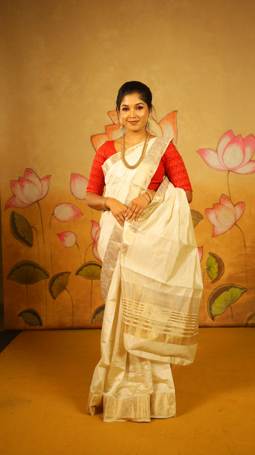 Refined ivory Semi Soft Silk Saree with rich gold zari woven border  - AVANTHIKA