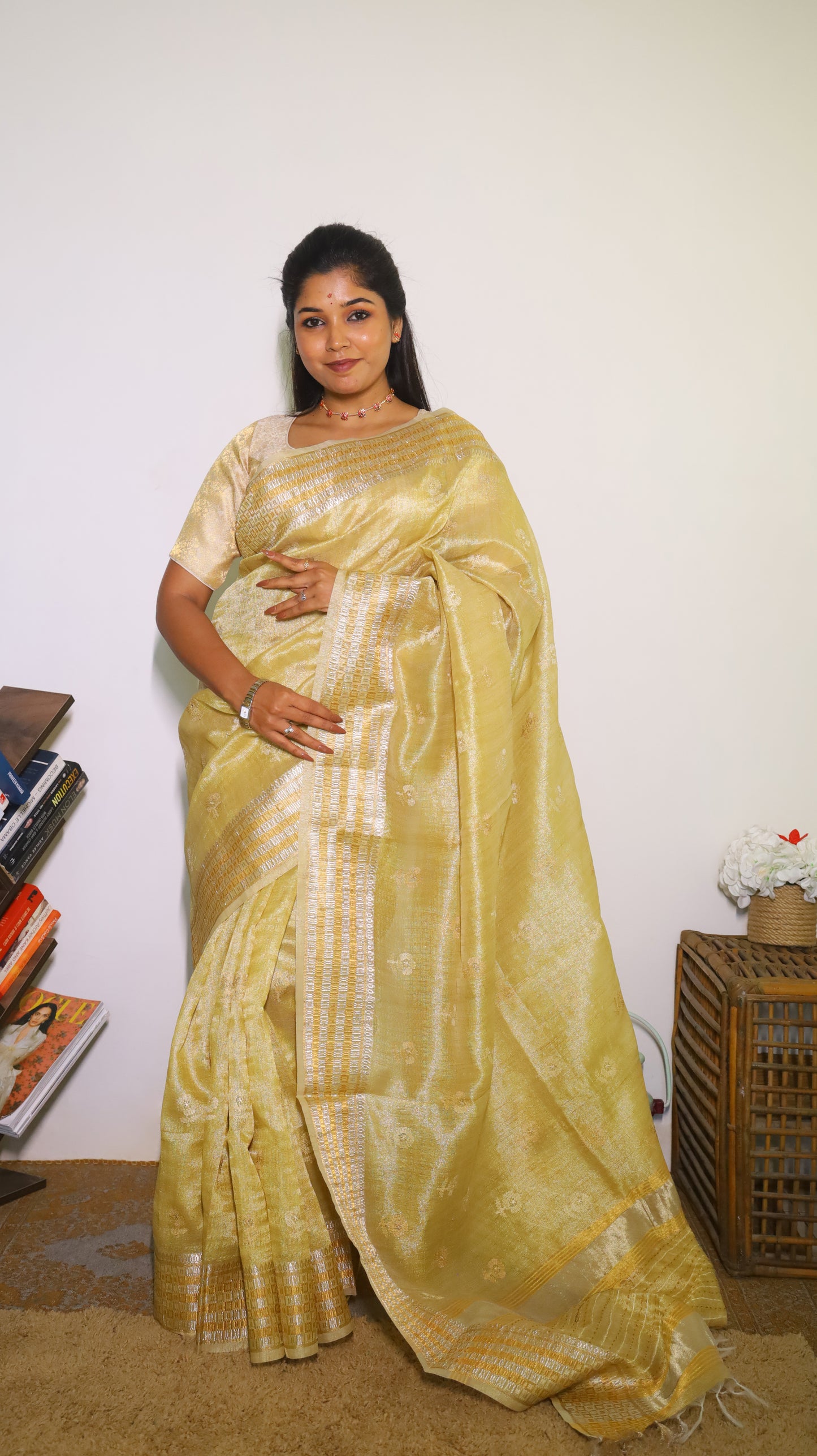 Exquisite semi silk saree in gold all over body and elegant border with subtle silver woven butta - Shruthika
