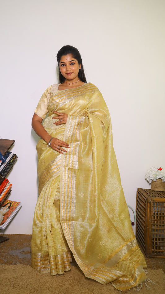 Exquisite semi silk saree in gold all over body and elegant border with subtle silver woven butta - SHRUTHIKA