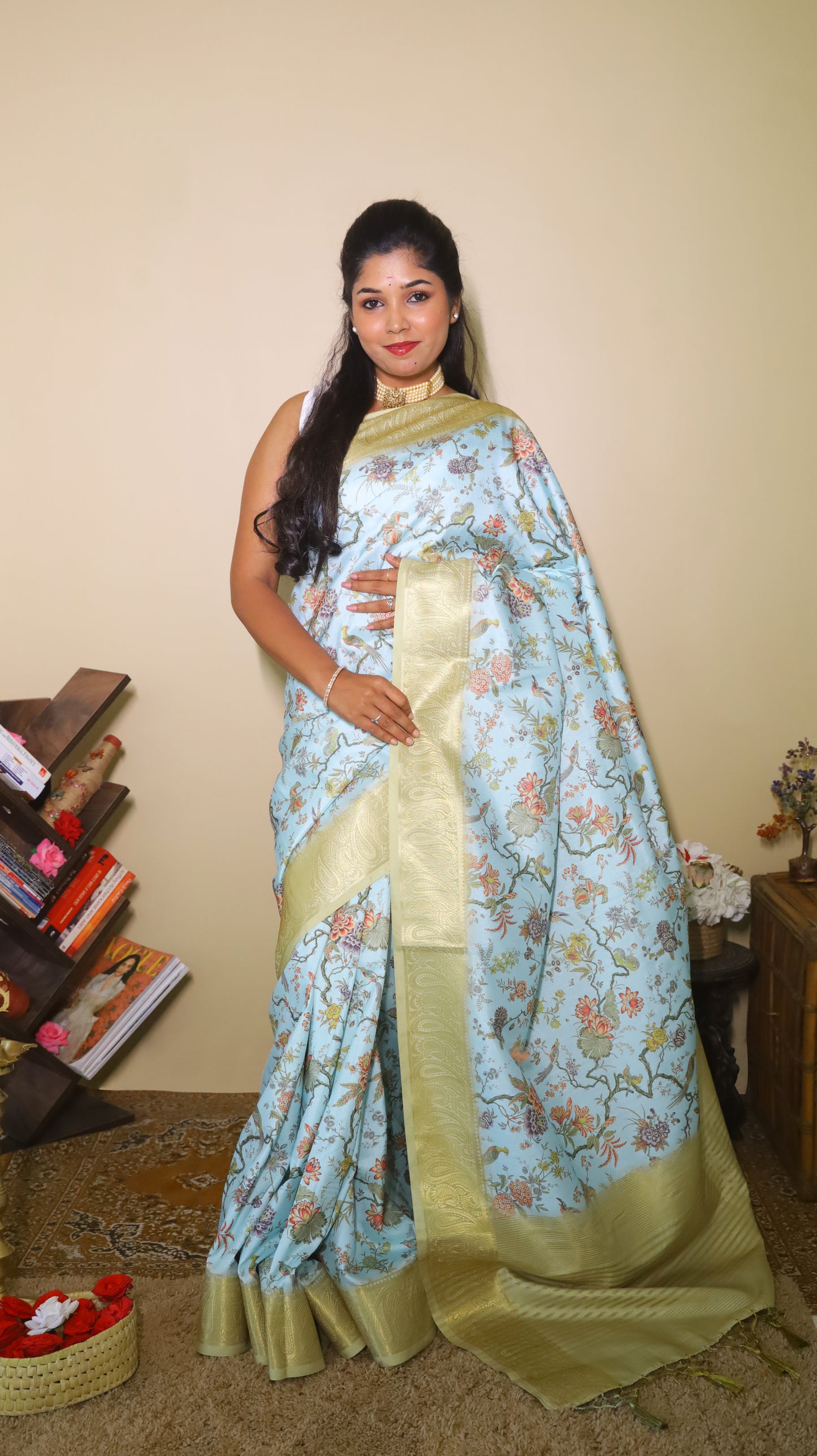 Luxurious Soft Silk Printed Saree with a serene light blue body, with intricate Lepakshi prints and gold satin border - AVANTHIKA