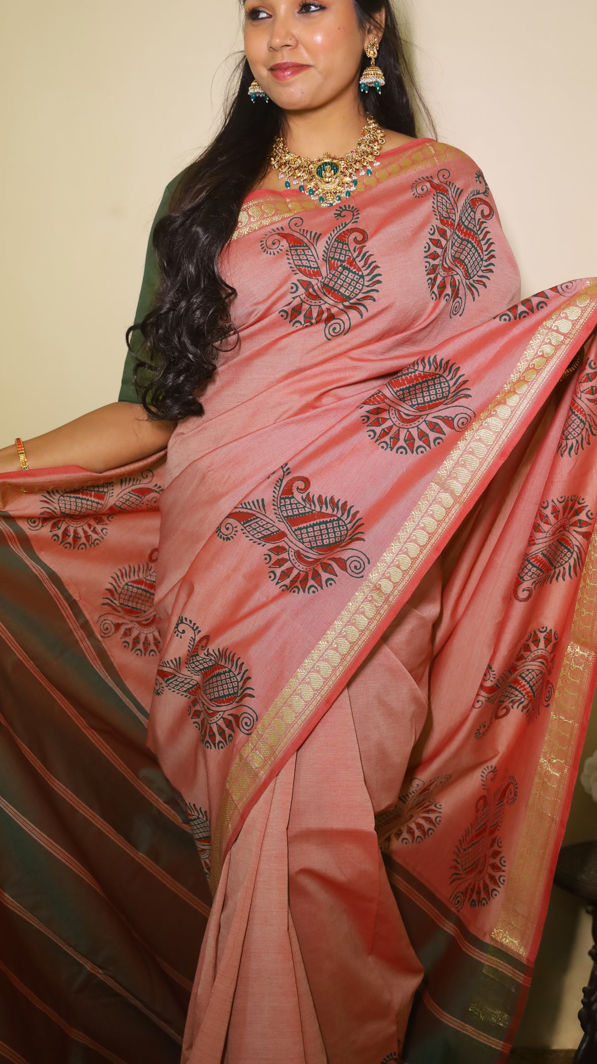 Silk cotton in muted pink with bold green and yellow manga paisley and mangai zari border with double shot red and green pallu - KRITHIKA (40011009)