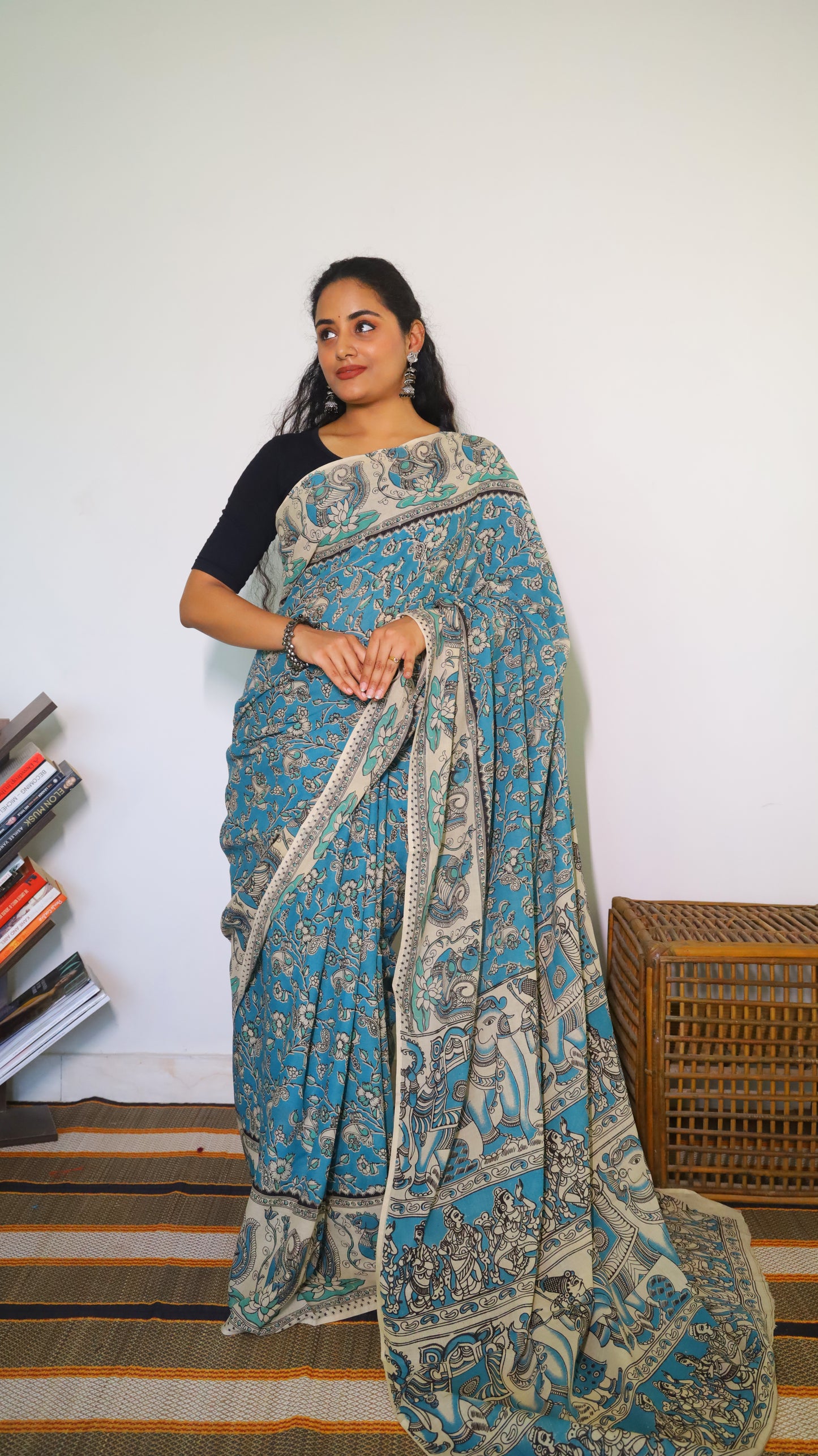 Featherlight teal blue cotton kalamkari saree featuring floral and paisley motifs - BOOMIKA