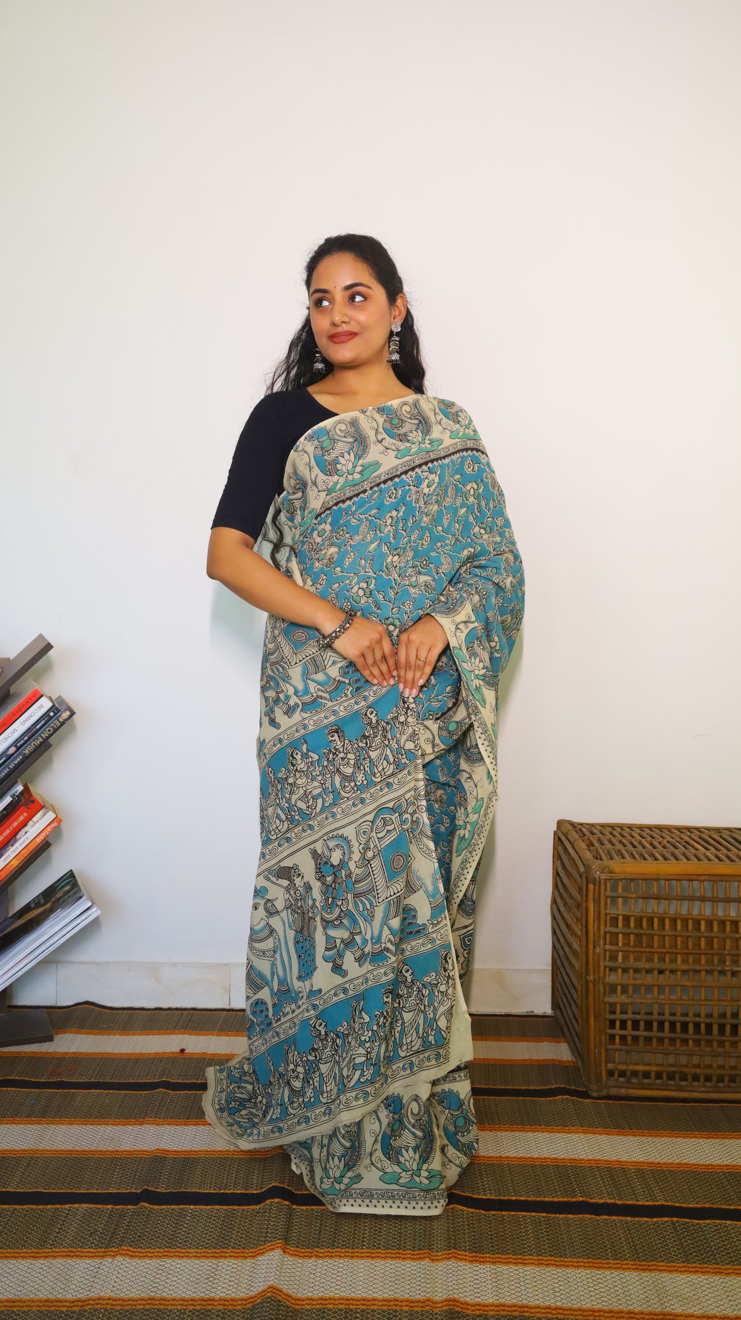 Featherlight teal blue cotton kalamkari saree featuring floral and paisley motifs - BOOMIKA