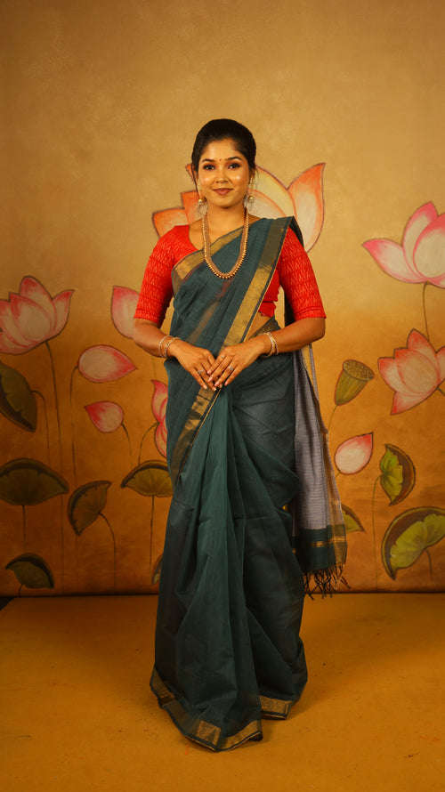 Elegant Mercerized Silk Cotton Saree with a bottle green body and zari border with greyish-blue pallu - AVANTHIKA