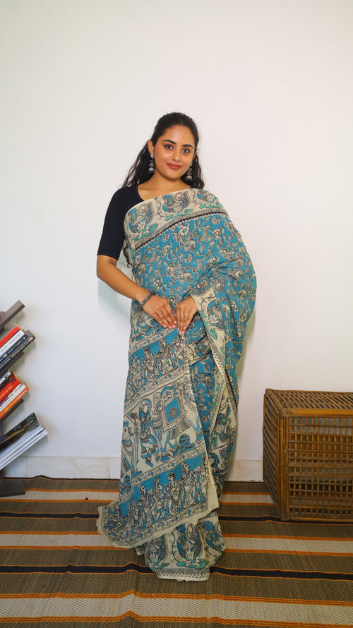 Featherlight teal blue cotton kalamkari saree featuring floral and paisley motifs - BOOMIKA
