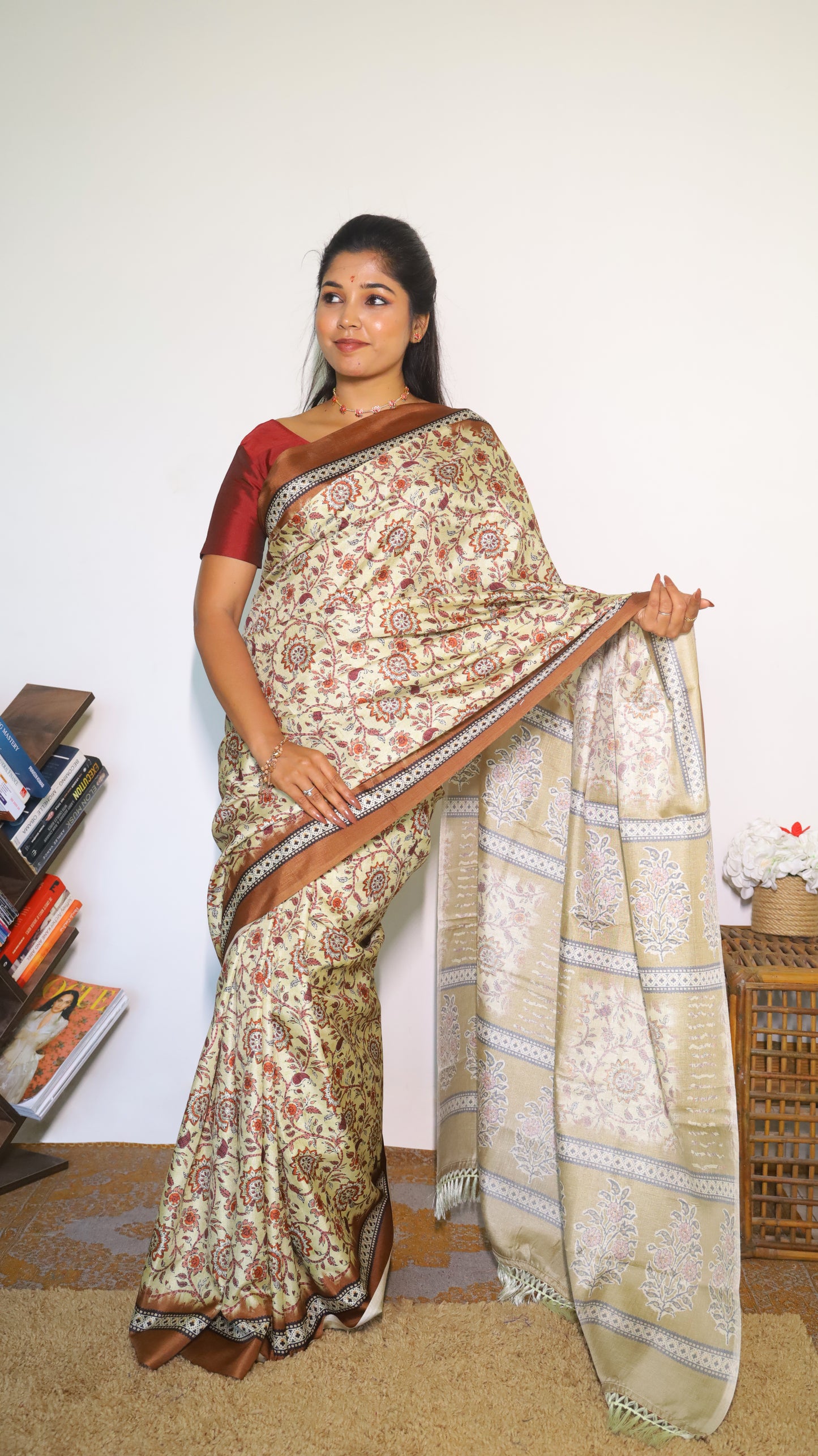 Sophisticated soft silk designer saree in cream and maroon with intricate floral motifs - AVANTHIKA