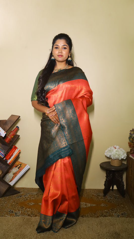 Luxurious soft silk red tissue saree with self imprint and bottle green border with gold zari - AVANTHIKA
