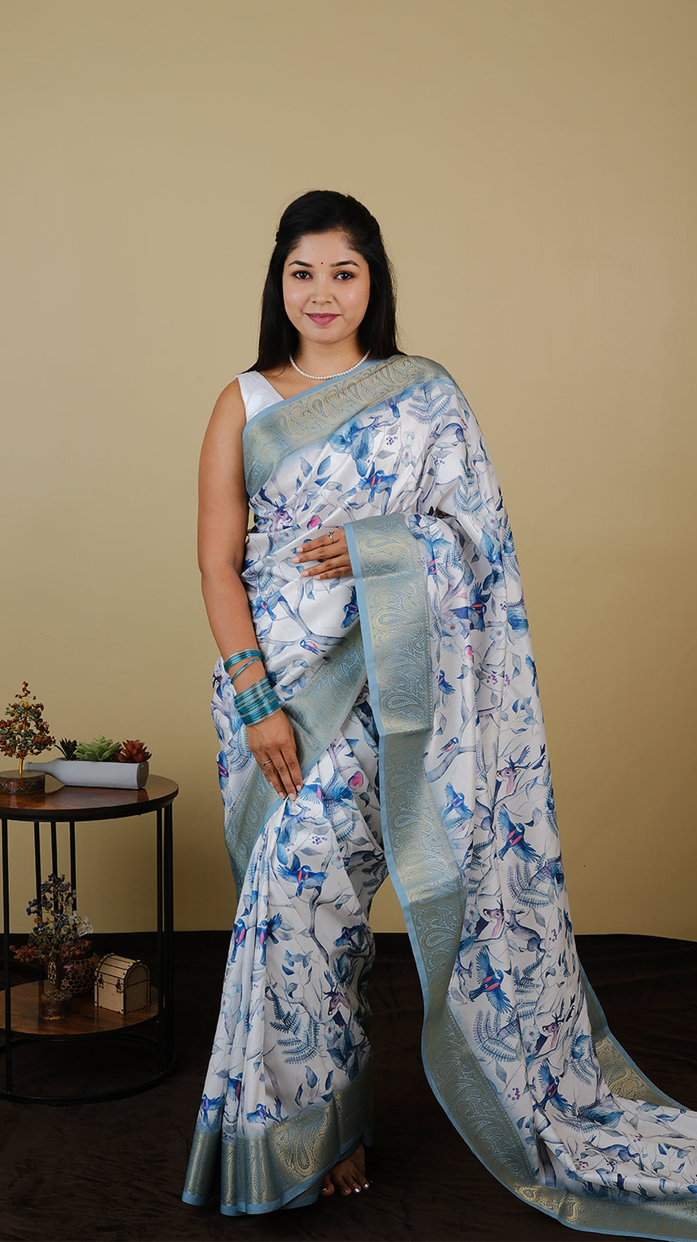 Digial print off white saree with all over bird print and teal green zari border - AVANTHIKA (20012008)
