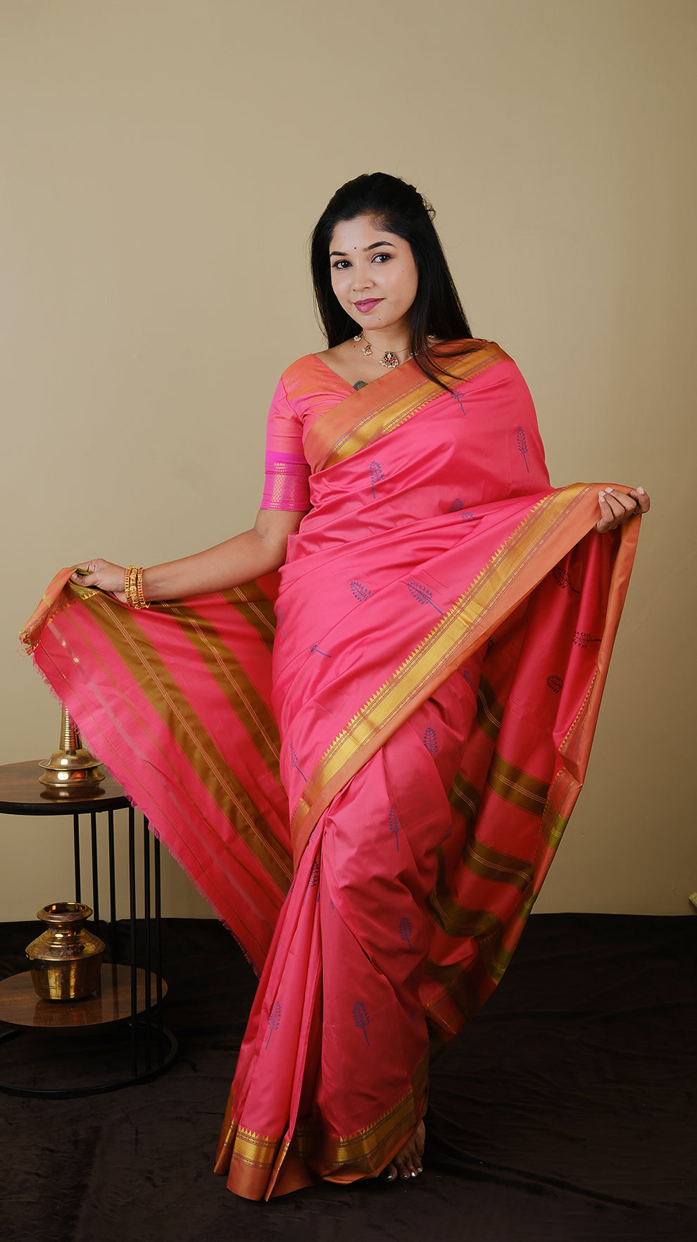 Elegant peach pink with olive combination silk saree adorned with blue woven motifs and contrasting gold zari border - AVANTHIKA (20003006)