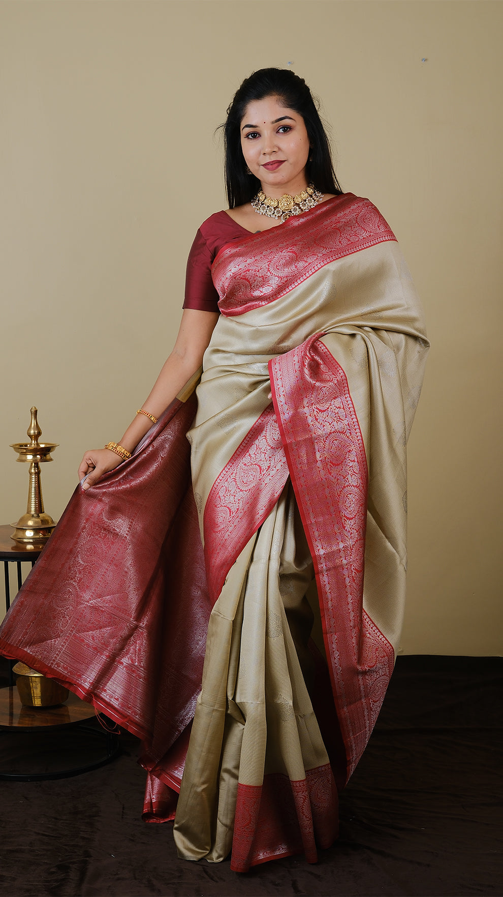 Mango silk brocade in deep cream with vairaoosi and silver motif body with blood red contrast pallu and double silver zari border - AVANTHIKA (20009023)