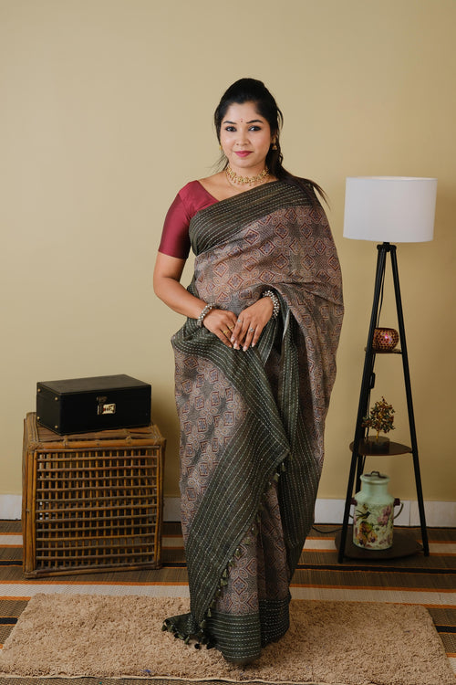 Soft cotton in olive green with mughal print and olive green embroided border - BOOMIKA