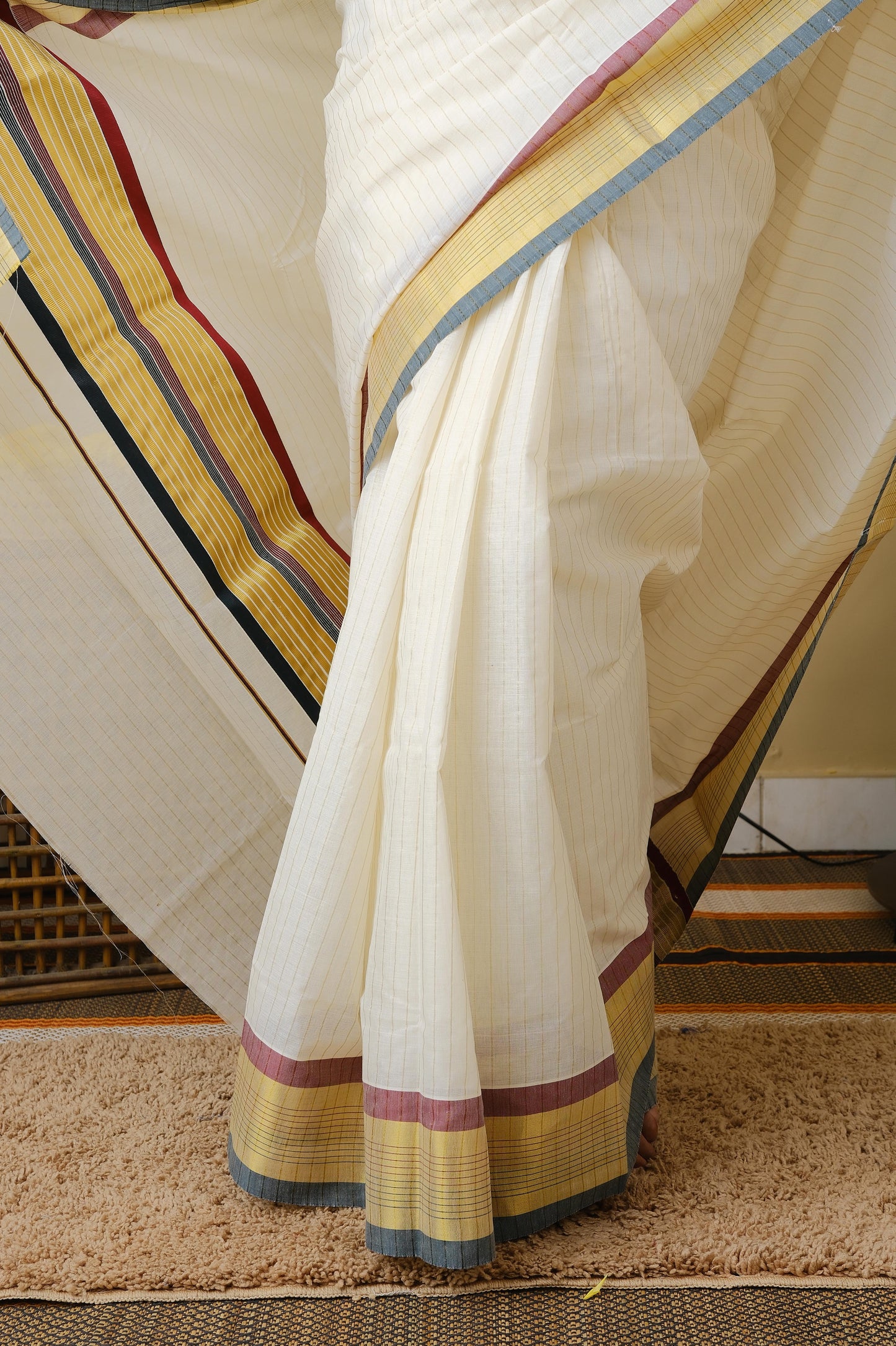 Pure kasavu cotton with striped zari body and double coloured border and pallu in traditional green and maroon - AVANTHIKA