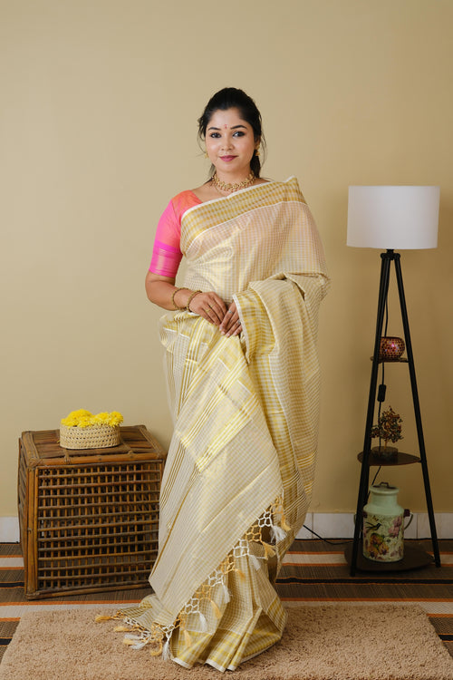 Onam kasavu silk in cream with all over checks in gold zari - AVANTHIKA