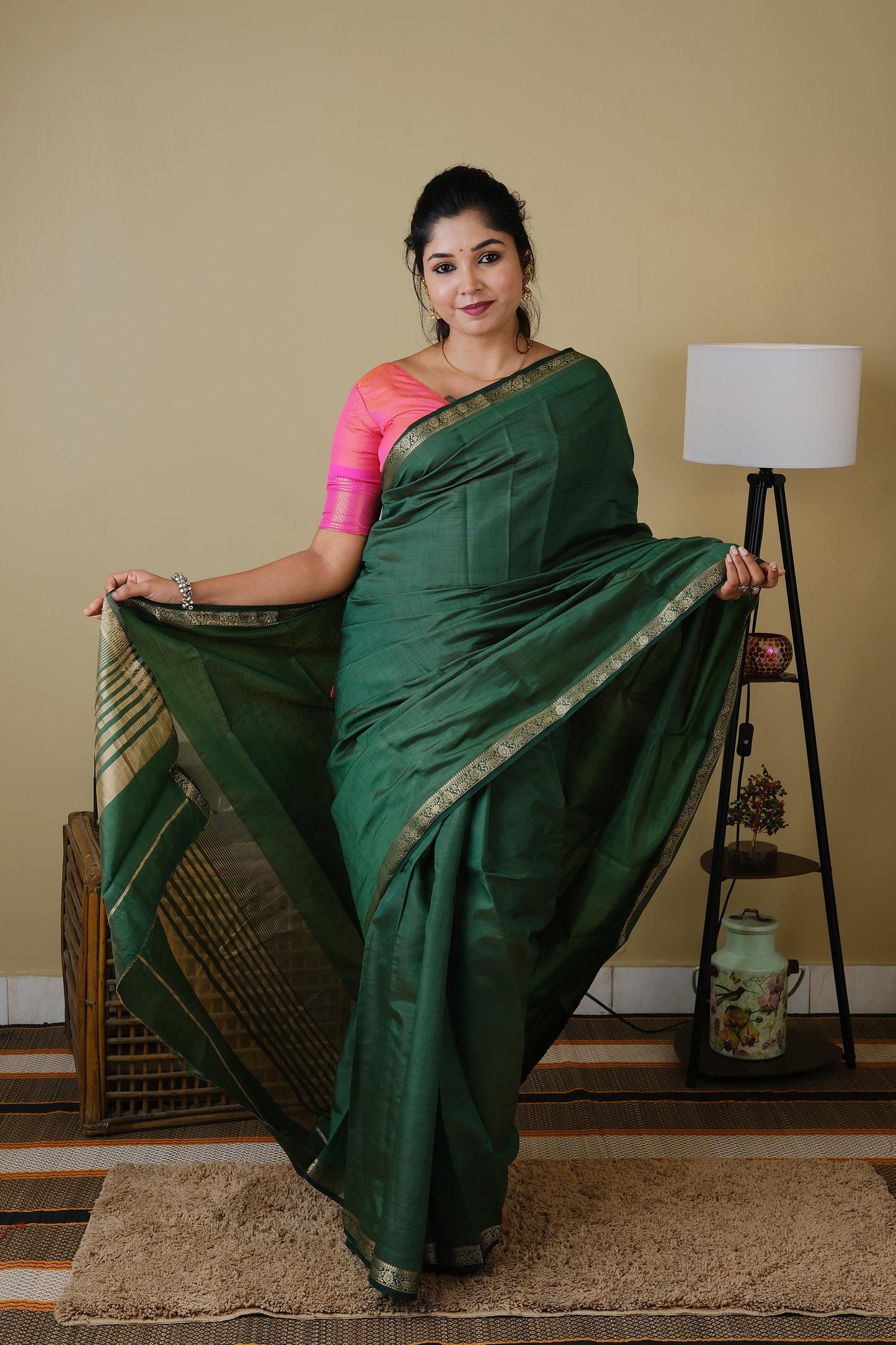 Exquisite soft silk olive green saree with zari border - AVANTHIKA