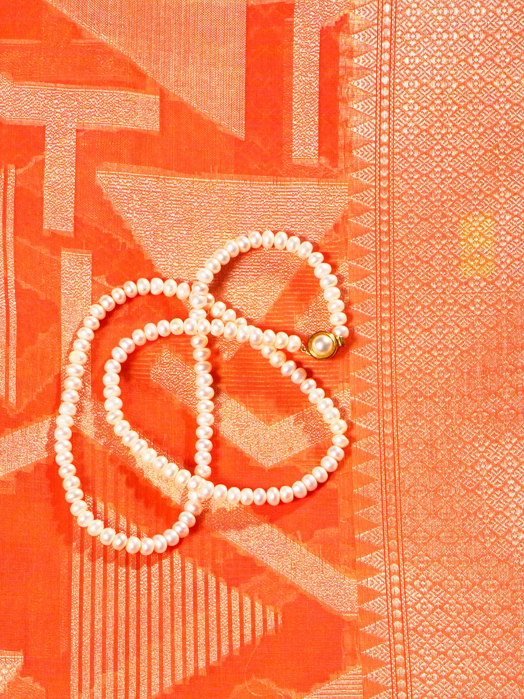 Manipuri cotton in peach orange with all over cream abstract and double border - KRITHIKA (30001005)