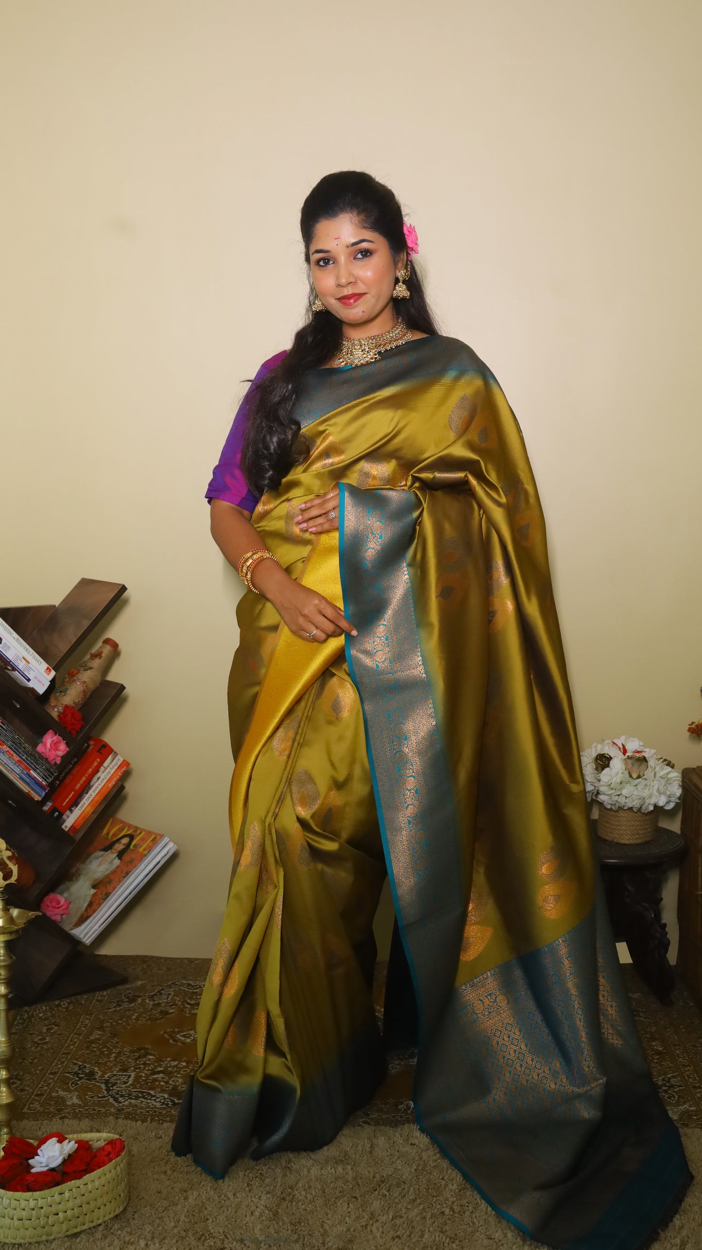 Finest chutney green saree with gold and silver motifs and a turquoise blue border - AVANTHIKA