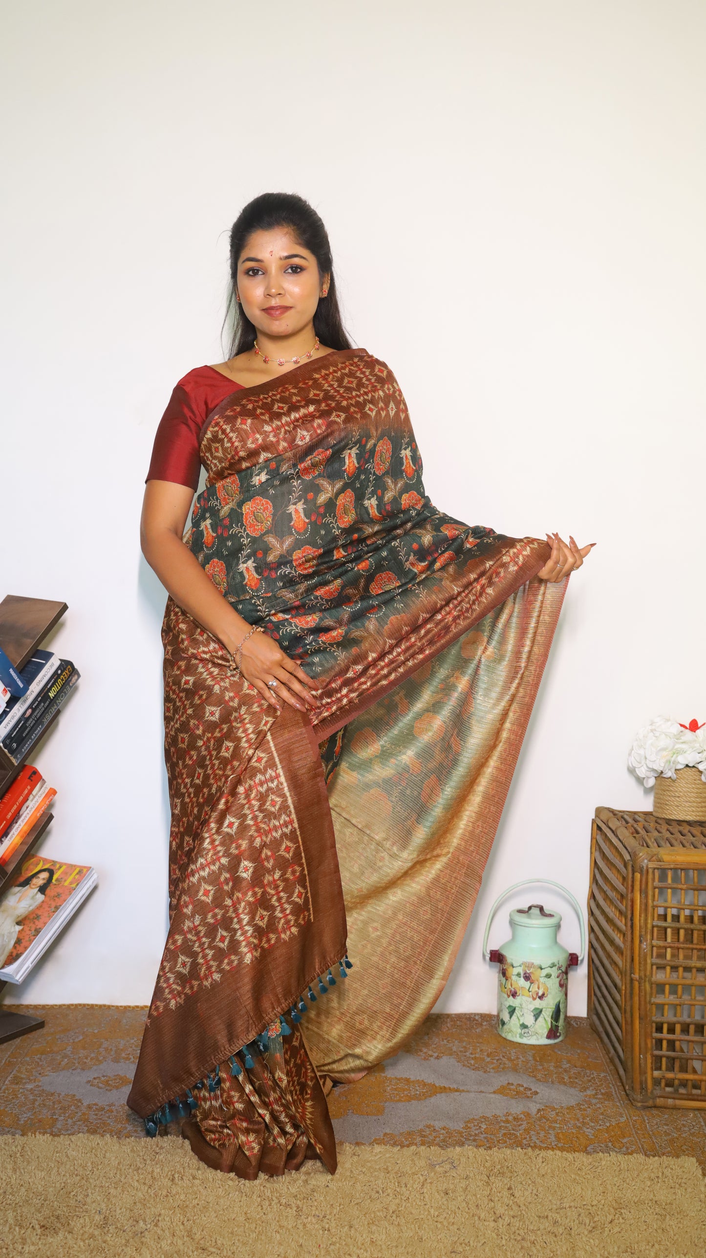 Elegant deep forest green body decorated with rust red and gold floral motifs