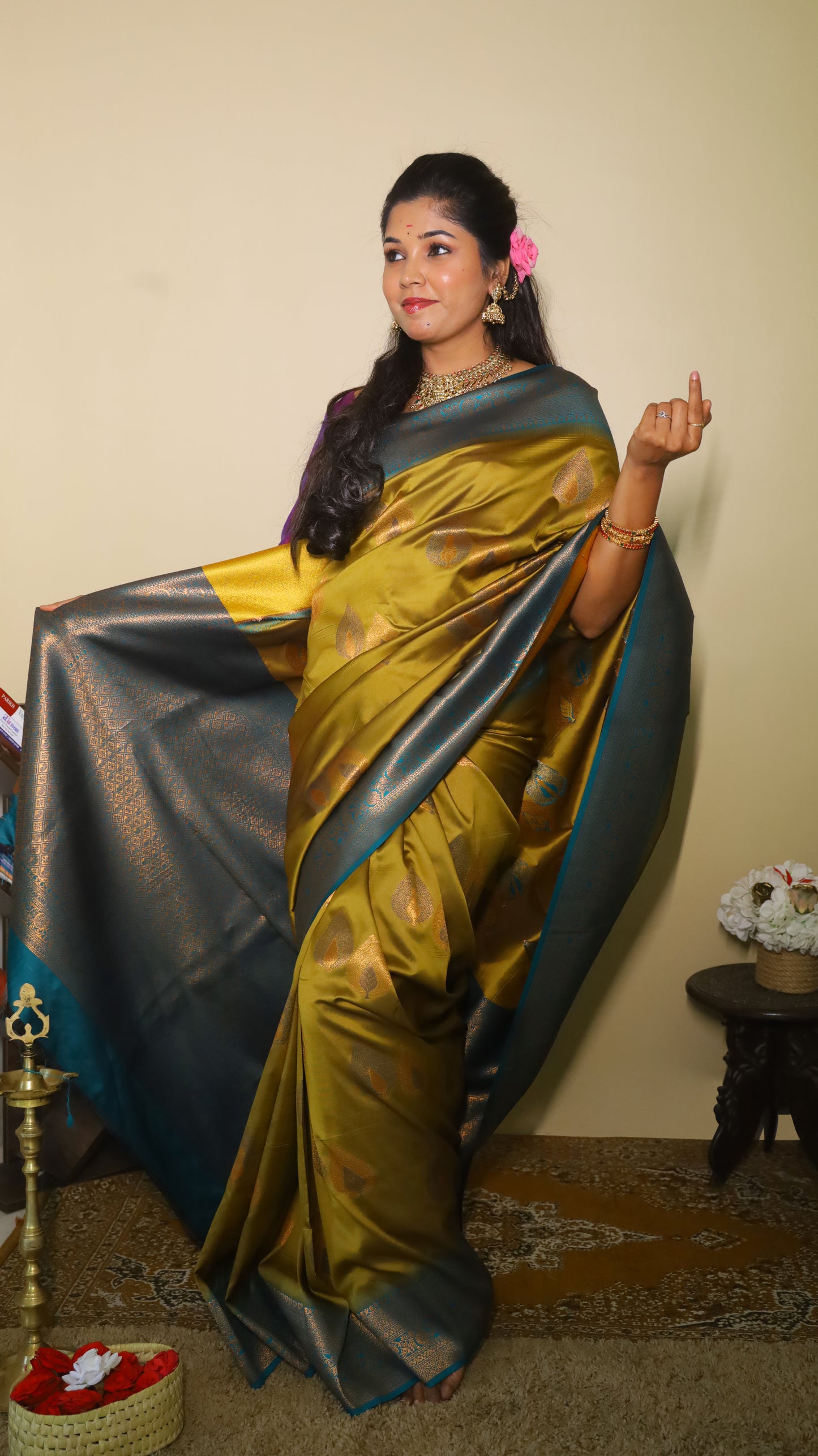Finest chutney green saree with gold and silver motifs and a turquoise blue border - AVANTHIKA