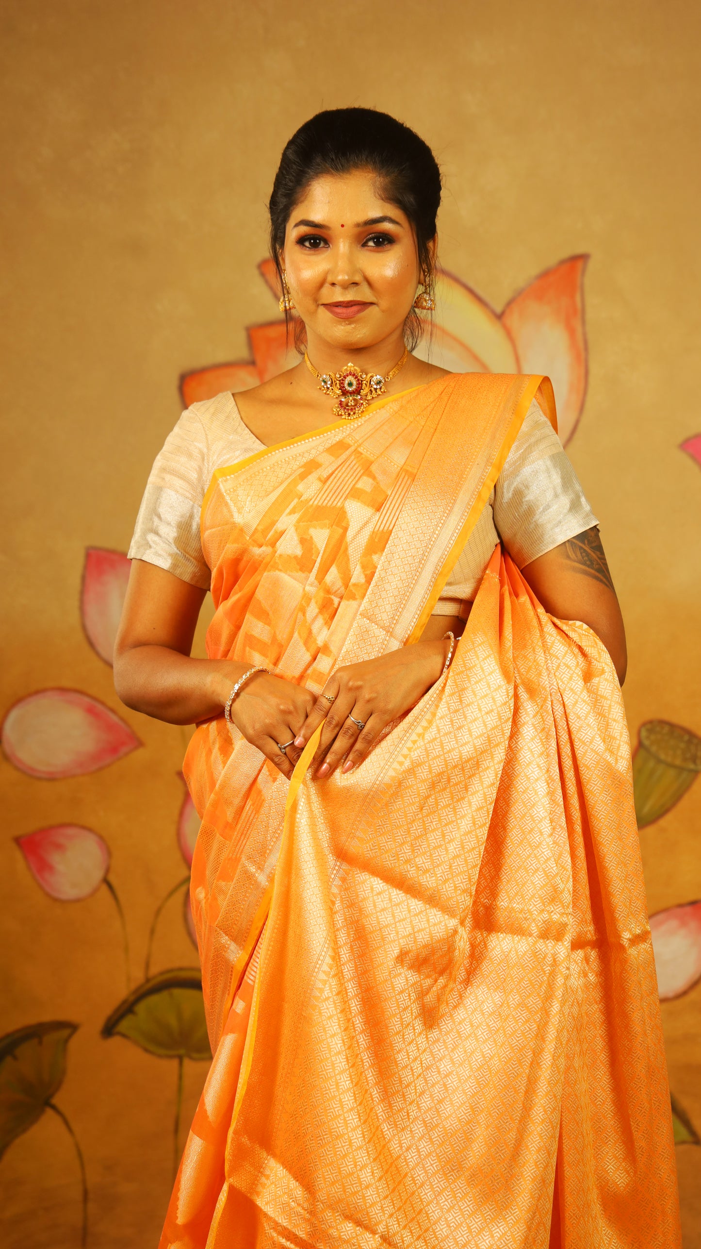 Luxurious Manipuri cotton saree in bright orange and brocade design with gold zari border - BOOMIKA